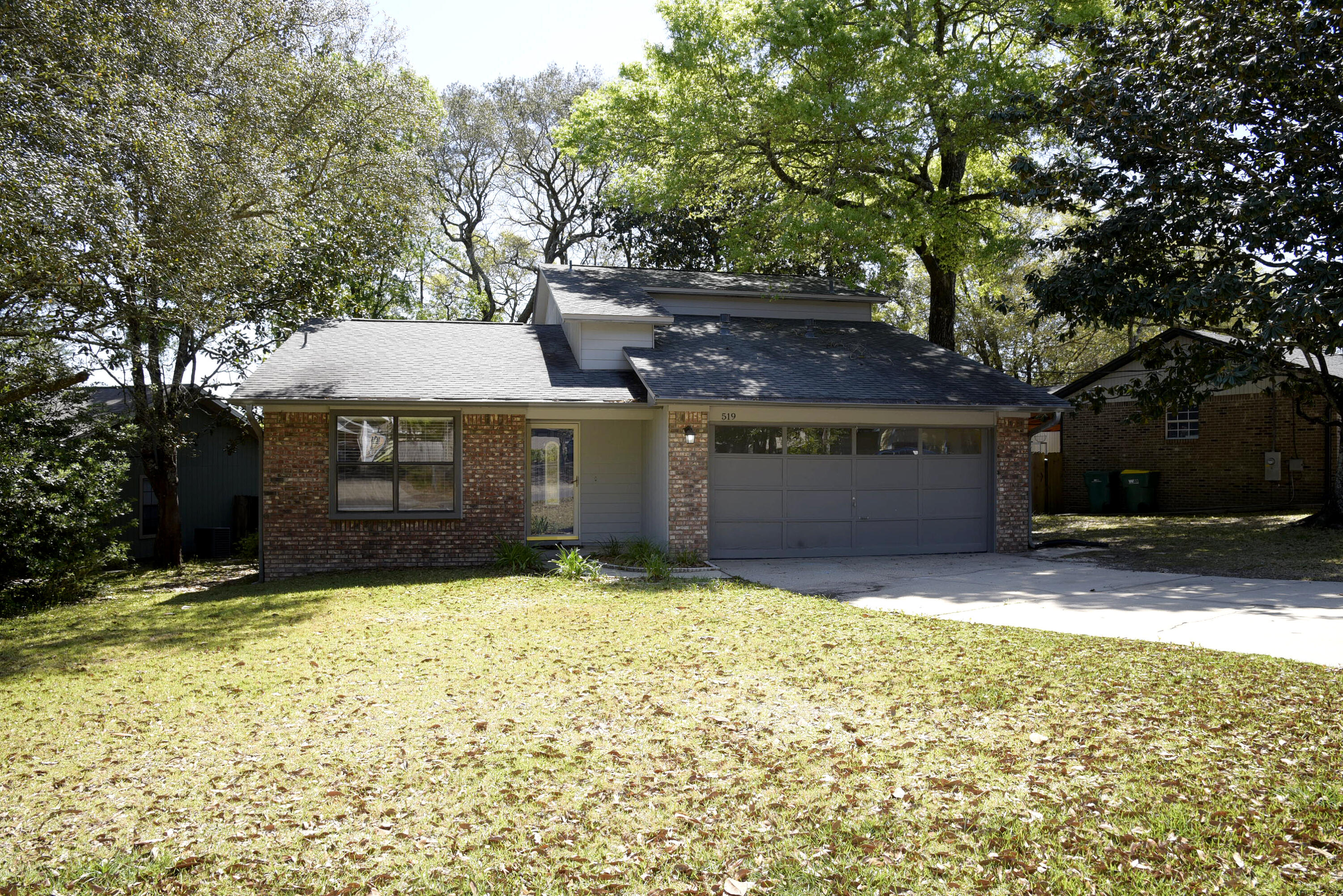 Great 3/2 home in the heart of Niceville! This home features large eat in kitchen with appliances (ice maker not warranted) & tiled floor for easy care. Living area has corner gas fireplace, hardwood flooring and access to back deck overlooking fenced in back yard. Grand main floor carpeted master suite with an abundance of natural light is able to accommodate larger furniture and offers 2 spacious master closets. Master bath offers separate vanity area and beautiful custom tile in tub/shower combination. Main floor Power Room offers custom tiled touches. Upstairs you'll find two carpeted bedrooms, each with a private balcony overlooking the back yard and a convenient guest bathroom. A two car garage with washer & dryer provided but not warranted and nice sized back yard finish off this great home. Owner will consider pets with restrictions and non refundable pet fee. Any pet must be spayed/neutered, housebroken and current on all shots. Any persons 18 years old or older must apply separately. Tenants required to carry renter's liability insurance.