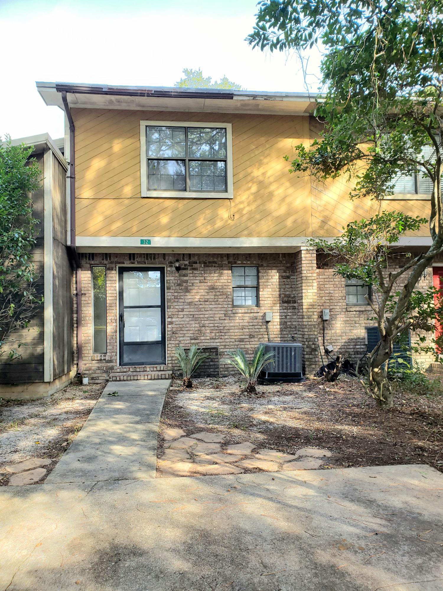 Two bedroom, two-story townhome located minutes to downtown Fort Walton Beach. The convenience of a half bathroom downstairs adds to the comforts of this unit. Back yard is fenced and the patio is screened in. Washer and dryer included. Master bedroom offers a walk in closet and private balcony that overlooks the back yard. Available for immediate occupancy.