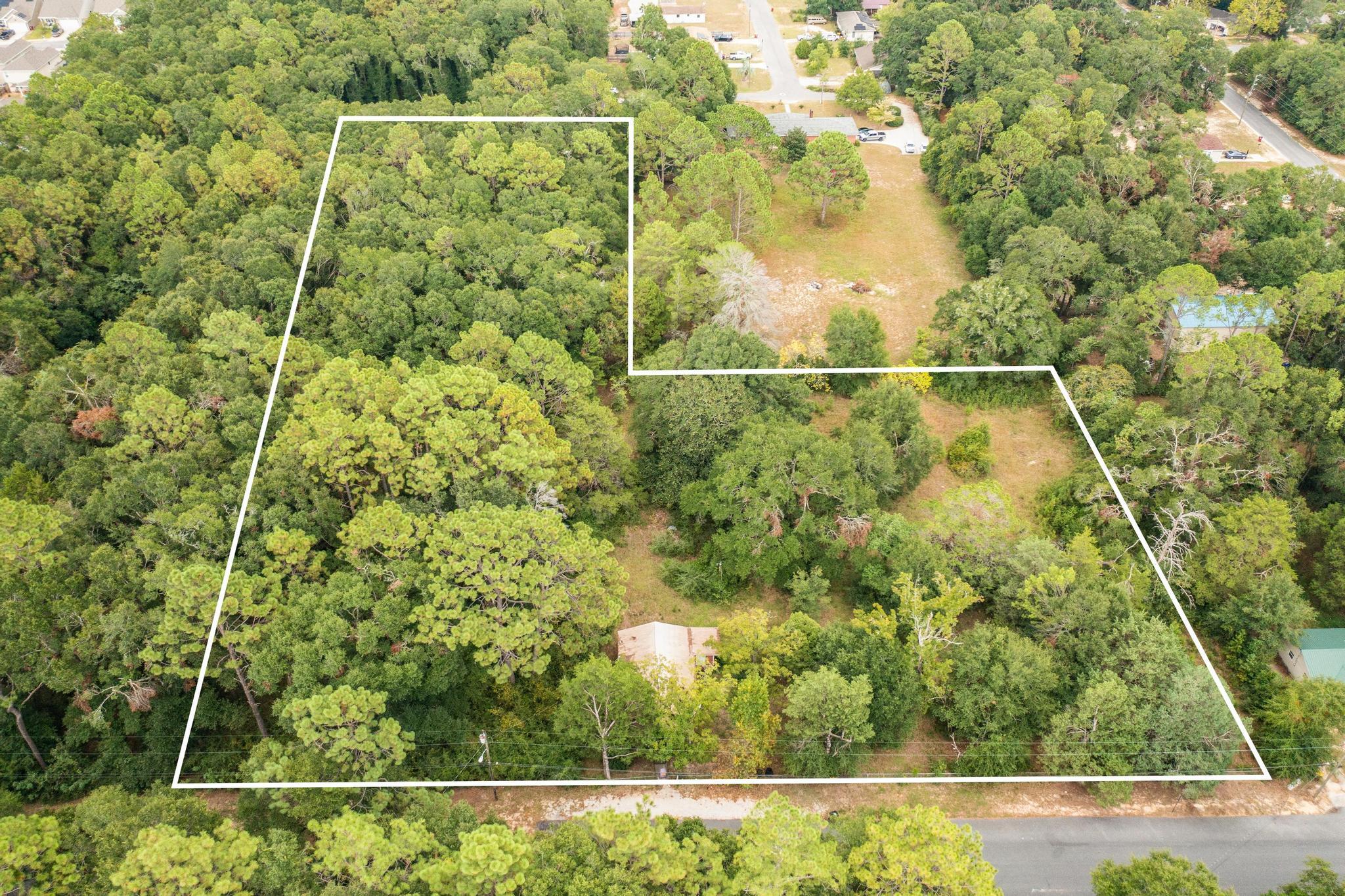Unlock the potential of this 3.25-acre lot, zoned R-3 with potential rezoning to commercial. The versatile R-3 zoning allows for a wide array of residential options, such as single-family attached or detached homes, duplexes, triplexes, quadplexes, and larger multi-family buildings. Additionally, it accommodates manufactured/mobile homes, offering even more flexibility.

Permitted uses also include assisted living facilities, adult congregate living, nursing homes, and family day care centers. Ideal for both residential developers and those interested in care facilities, this land offers endless possibilities. Whether you are looking to create a cozy neighborhood or a larger multi-family project, this property provides. 

water/sewer/electric currently ran. Survey available