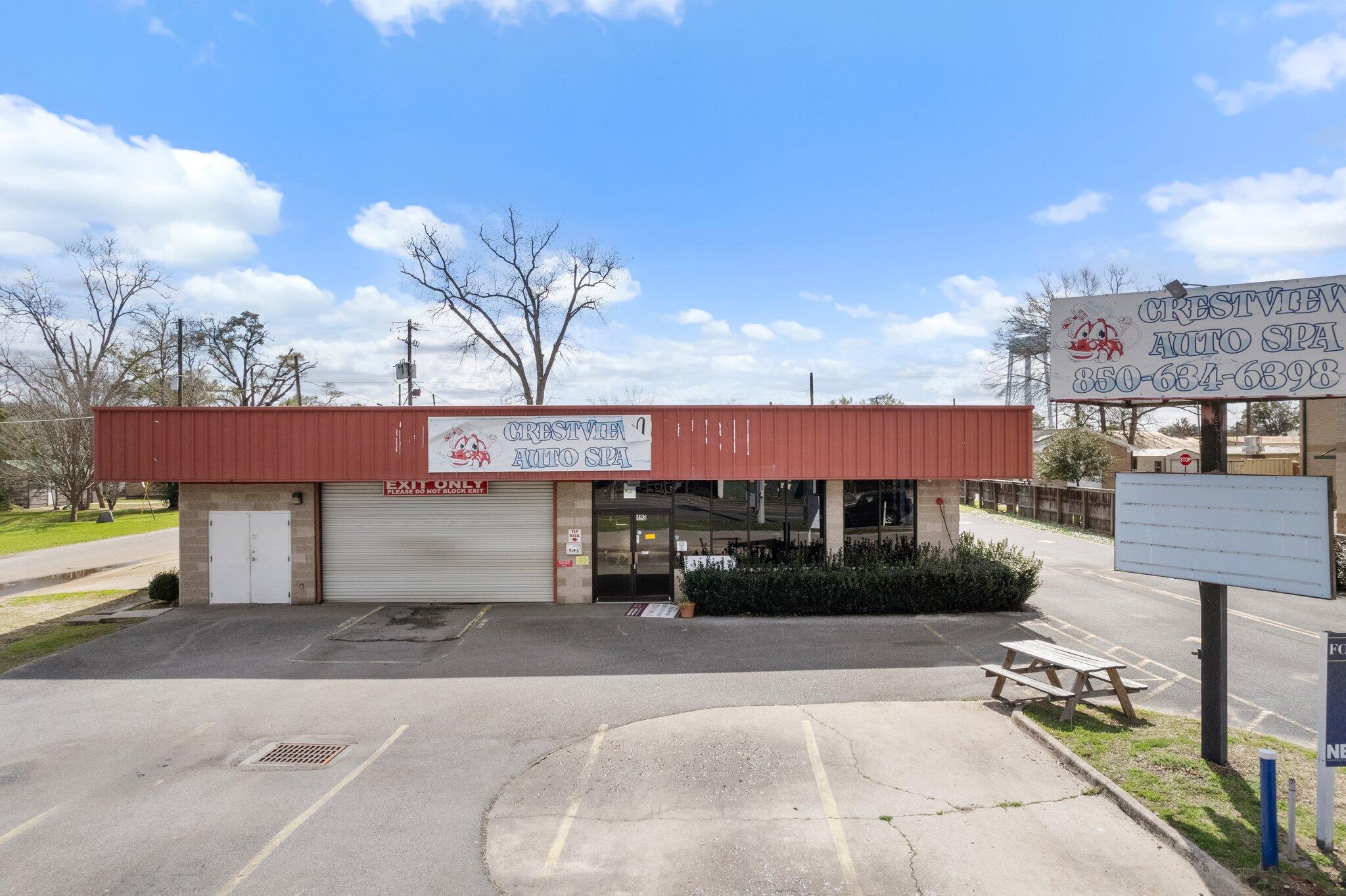 Located at 493 N Ferdon Blvd in Crestview, FL, this 4,500 square foot commercial flex space offers exceptional visibility and versatility just north of I-10, surrounded by major retailers like Tractor Supply and Walmart Neighborhood Market. Built in 2001 on a 0.32-acre corner lot, the property features four bay doors, prominent signage options, and direct frontage on Hwy 85 with an average daily traffic count of 29,500 vehicles. Zoned for commercial use, it's ideal for office, retail, or warehouse conversion and supports a wide range of business models, from logistics and light industrial to professional services or showroom concepts. With flexible lease terms and build-to-suit potential, this property presents  opportunities for owner-users or investors.
