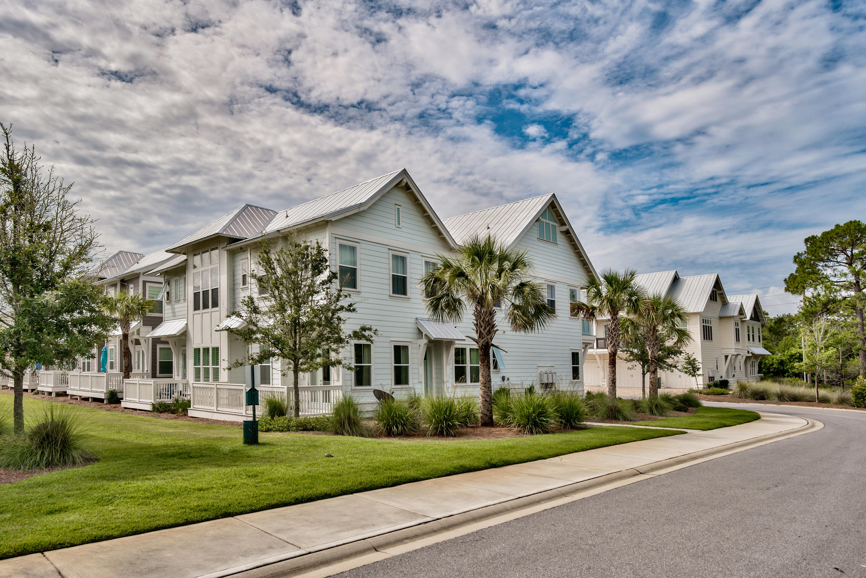 Truly a beach retreat that has it all, this 3 bedroom/2 bathroom townhome in Prominence exudes luxury and convenience. Supremely located within Prominence, bordering the state park, privacy is one of the many luxuries of this home. This home is outfitted with every upgrade. There are premium hardwood floors and tile throughout, plantation shutters, granite counter tops, and upgraded light fixtures, just to name a few! It is also beautifully appointed with Restoration Hardware furnishings and decor.
The first floor features a lovely open floor plan with a living, dining, and kitchen area providing comfort and ample space for entertaining. French doors off of the living area open to a porch that overlooks a large greenspace as well as the state park.
Upstairs you will find a spacious master suite, with an en suite bath, as well as two guest bedrooms and one additional full bathroom. 
 The community of Prominence boasts amenities including a luxurious resort style pool, a state of the art fitness center, and a private shuttle providing transportation to the beach.  Another wonderful feature of this community is it's town center, The Hub, located just across the street!  Full of restaurants, shops, an amphitheater and activities galore, there is truly something for everyone.
This fabulous home would make a great choice for a personal beach getaway or rental investment.   Don't miss out on the opportunity to own a perfect beach home in a wonderful community!