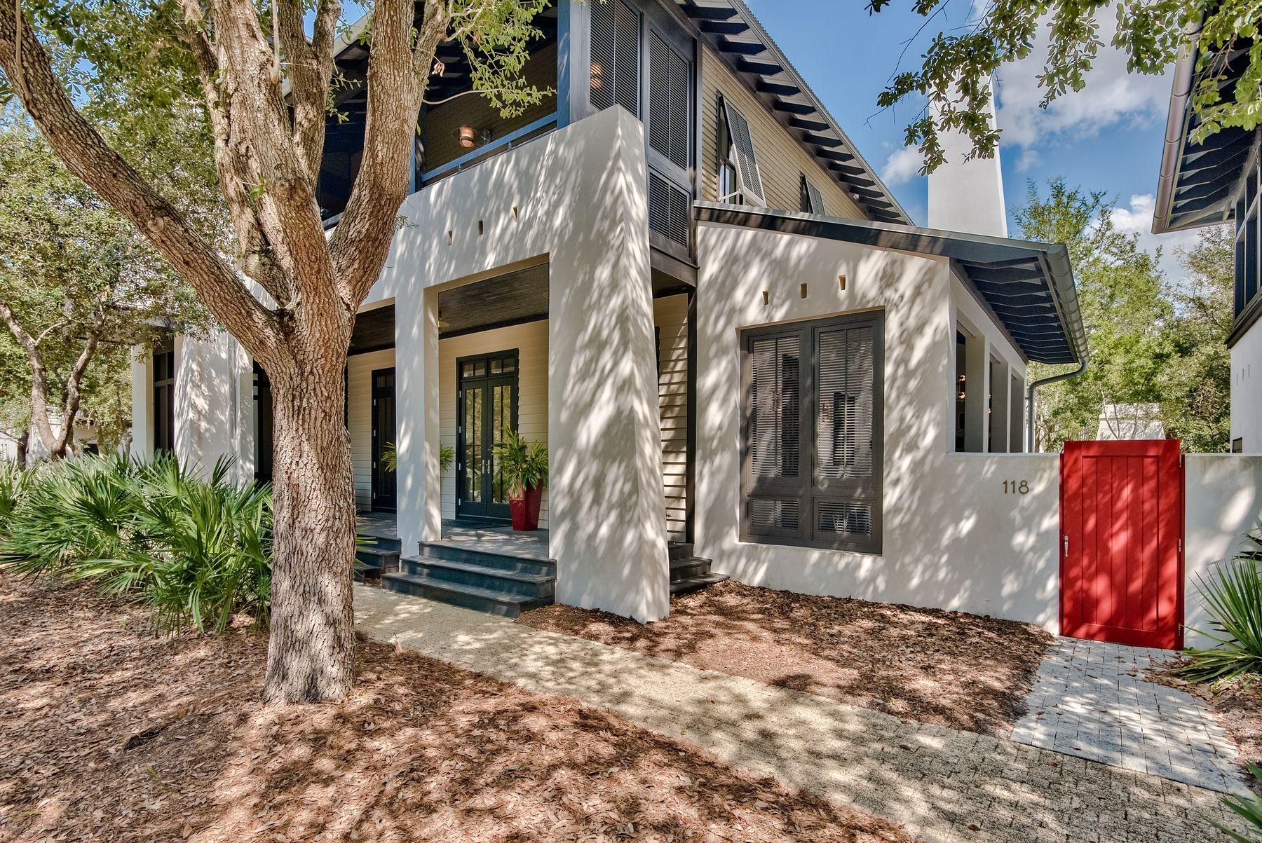 72 hour kick out clause in place. If you get a sense of dj vu from this property, you could be right. This artfully designed home by Tim McNamara was featured on the pages of Coastal Living magazine. Located on a large corner lot, this lovely home has green views across the street in the shady greenery of a pocket park. This rather special home in Rosemary Beach has an open floor plan with lots of light thanks to the adjoining side porches. Open the multiple sets of French doors and appreciate the bonus outdoor living space complete with dining area. The cozy outdoor fireplace casts a rosy glow of warmth for evening sundowners or casual entertaining. More formal dining can be enjoyed beneath the contemporary chandelier with food inspired by the zesty contemporary kitchen. It combines practicality with a definite wow factor. Four bedrooms include a well-planned bunk room, all served by beautiful bathrooms. Private balconies on the second floor and a lofty look-out tower above are ideal for welcoming the fresh morning breeze that heralds each new day. Adjacent to this unique home is a generous two-car garage with a screened porch above. It has the potential for converting into an amazing carriage house for guests and family. Just a short stroll from the white sandy beach, Rosemary Beach is a treasure trove of boutiques, dining experiences and amenities. Brick-lined streets are lined with independent stores in the pedestrian-friendly town center. Miles of boardwalks and trails are just waiting to be explored on foot or bicycle and you can warm up at the fitness center before playing tennis or going for a swim. Four pools include one that is covered and heated for owners' year-round use.