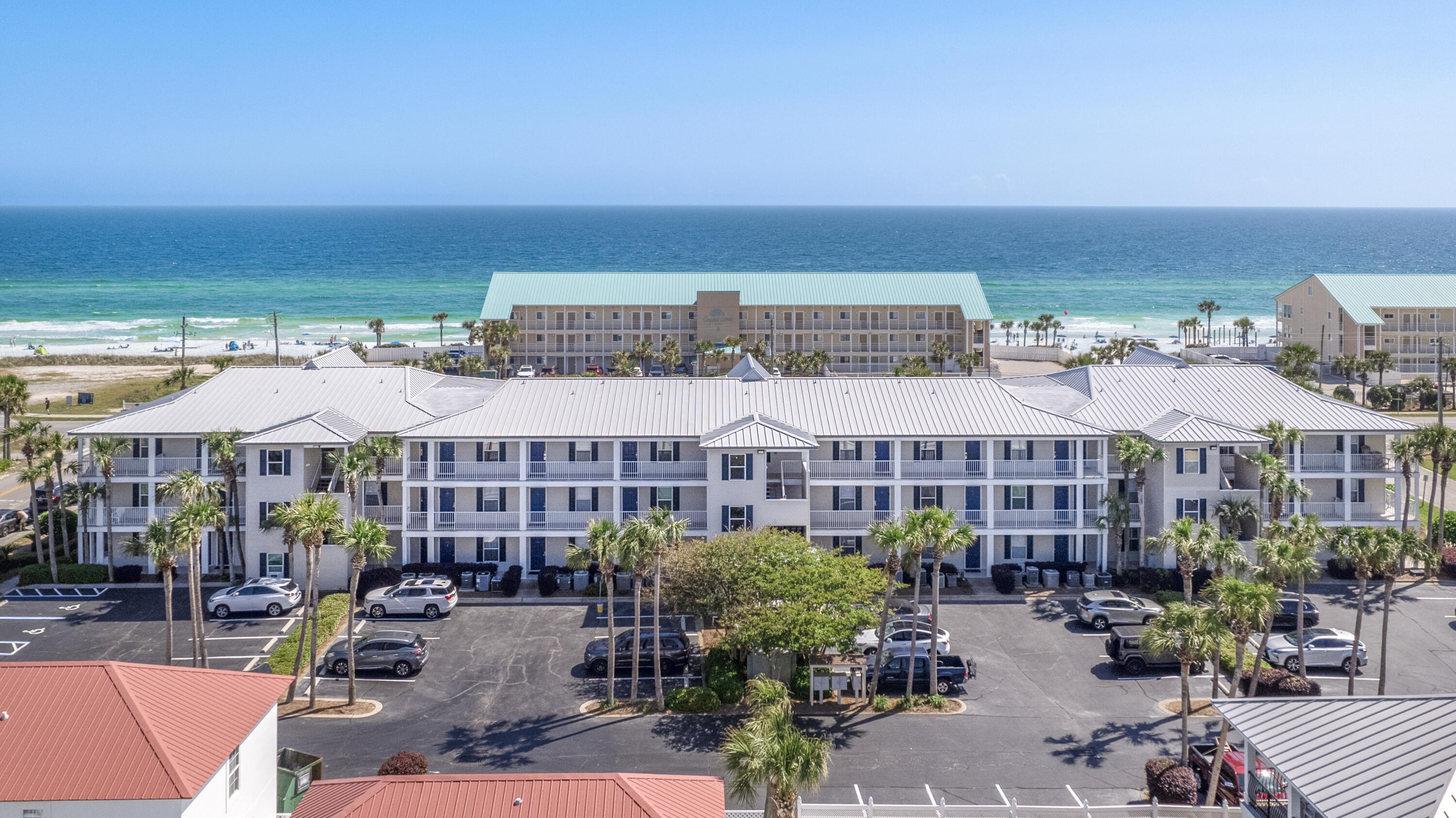 This third-floor unit is located in Grand Caribbean East - a three-story property settled in the quiet and desirable Crystal Beach area of Destin. This upgraded two-bedroom, two-bath unit features wood look vinyl plank flooring, open main living areas, a large private balcony, and beautiful Gulf views. With a large master suite, guest suite, and hallway bunks, there is plenty of room for guests. The kitchen features wood cabinetry, granite countertops, a breakfast bar, and a large pantry closet. Grand Caribbean amenities include well-kept grounds, a pool and hot tub, grilling and picnic area, and large private parking lot. The beaches and beautiful emerald green waters of the Gulf are easily accessed by two dedicated walkways directly across the street. Grand Caribbean East is also within minutes of the many great shopping and restaurants Destin has to offer. A beautiful paradise!