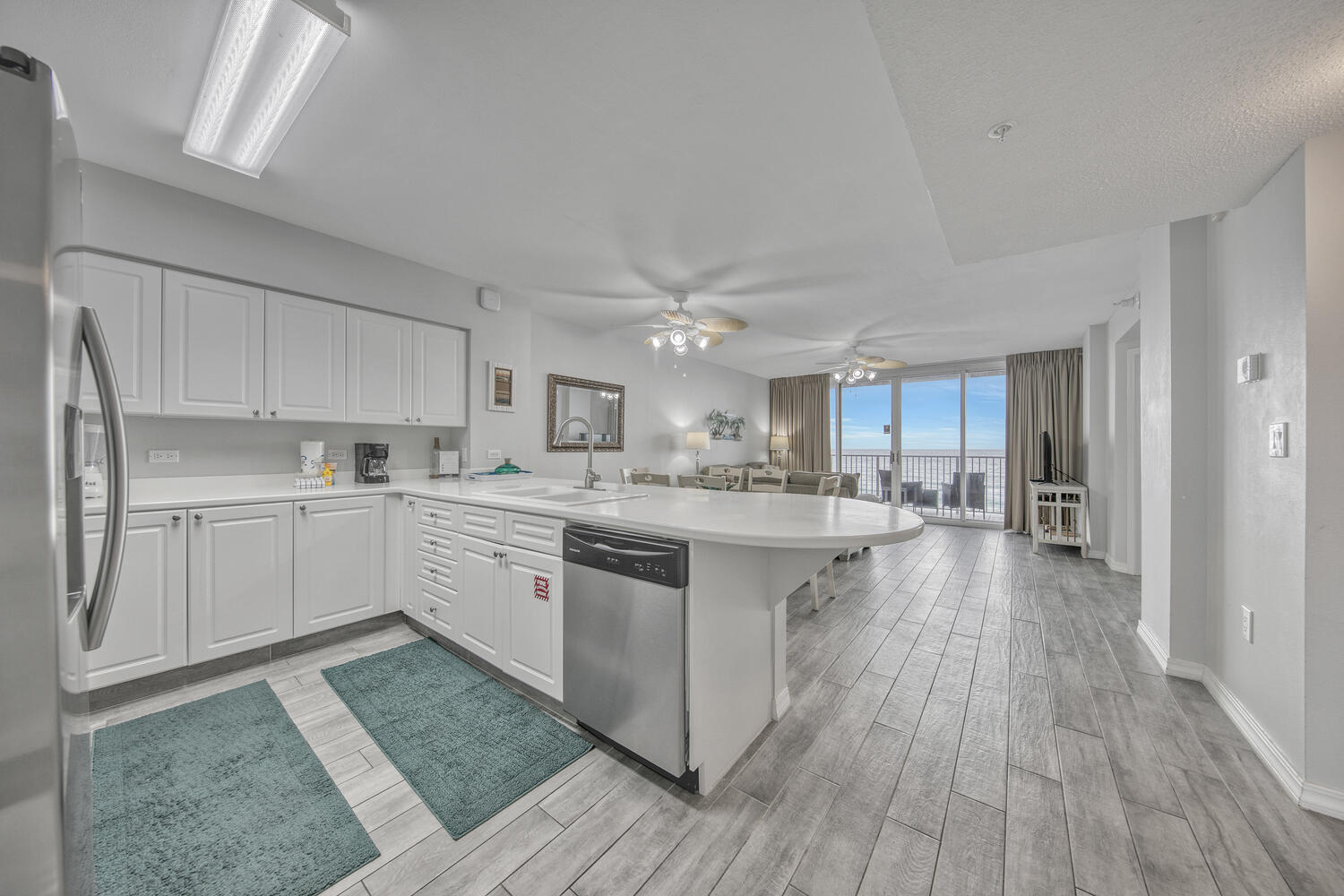 This beautiful direct Gulf Front condo gives you everything you are looking for. Panoramic views of the beach and just steps away from the sand and water of the Gulf of Mexico.  Lovely decor and wood grain ceramic tile  along with the open floor plan make this condo pop. Fully furnished including stainless appliances. The kitchen is fully stocked with everything you need.  HVAC and Water Heater replaced in 2019.  Pool, fitness center , and other great amenities. Located near many fun attractions. Make family memories and/or cash in $$$ on rentals.   No assigned parking spot with this condo but plenty of available parking for general use.    Buyer to verify all information.