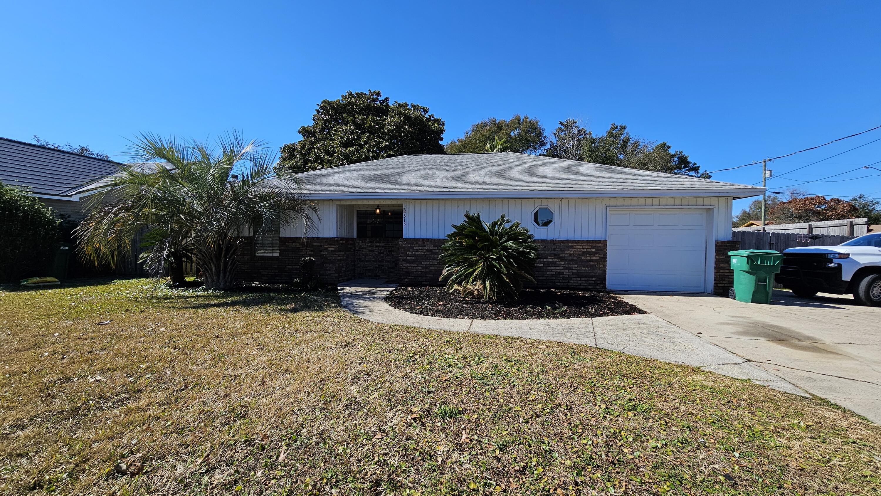 This 4 bedroom 3 bathroom home is located in the heart of Destin. The in-ground pool is located in the privately fenced in back yard. There is a covered patio, and freshly landscaped back yard is a great place for entertaining. Upon entering the home, you will find an open floor plan with the living room and kitchen complete with beautiful hardwood flooring, a fireplace, and cathedral ceilings. The kitchen boasts a breakfast bar, granite countertops, with tons of counter space, recessed lighting, tile backsplash, and stainless steel appliances. The large master bedroom has a reading nook. The master bathroom has double sinks. Washer and dryer in the home. There is a one car garage. The driveway offers plenty of space for parking. This home is pet friendly with restrictions.