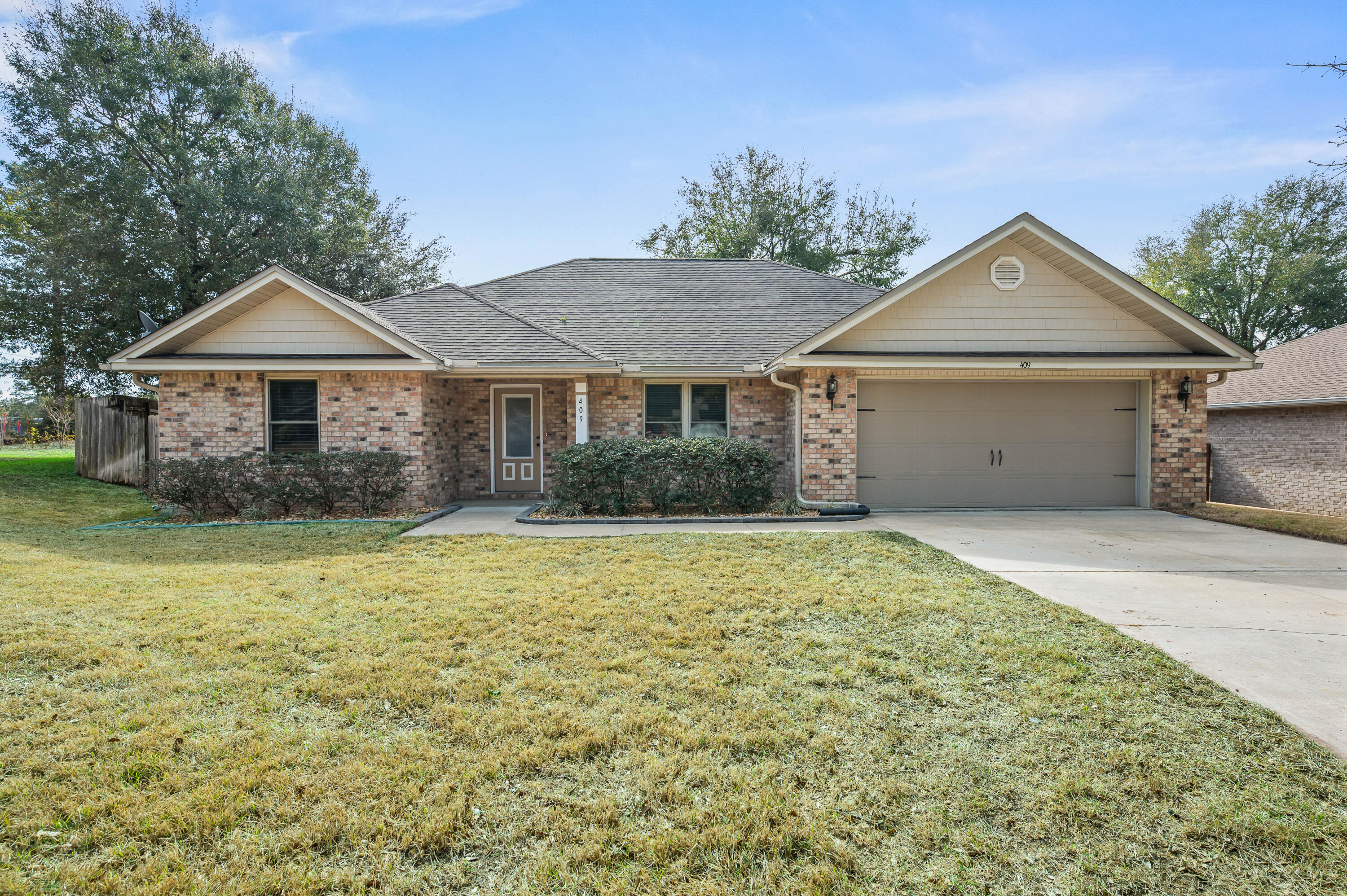 Welcome home to this move-in ready brick beauty tucked away on a quiet cul-de-sac in the highly desirable Trailwood Estates of Crestview. This thoughtfully designed 3-bedroom, 2-bath home includes a versatile flex space that can easily serve as a home office, formal dining room, or potential fourth bedroom to fit your lifestyle needs. With a sought-after split floor plan, 9' ceilings, and rich hardwood floors, the home offers a warm, open, and inviting atmosphere throughout.

The spacious and light-filled living room is perfect for gathering and flows effortlessly into the stunning kitchen, featuring granite countertops, stainless steel appliances, and a generous breakfast bar—ideal for casual meals or entertaining guests. Retreat to the private master suite, complete with a large walk-in closet and a spa-like en-suite bathroom showcasing double vanities and an oversized tiled shower with dual shower heads.

Two additional large bedrooms provide comfort and space for family or guests. Step outside to the covered lanai and enjoy a backyard designed for entertaining, weekend BBQs, or relaxing evenings outdoors. A convenient storage shed offers additional space for lawn equipment and tools.

Combining comfort, functionality, and timeless style, this home is a standout opportunity in a sought-after neighborhood. Schedule your showing today and fall in love!