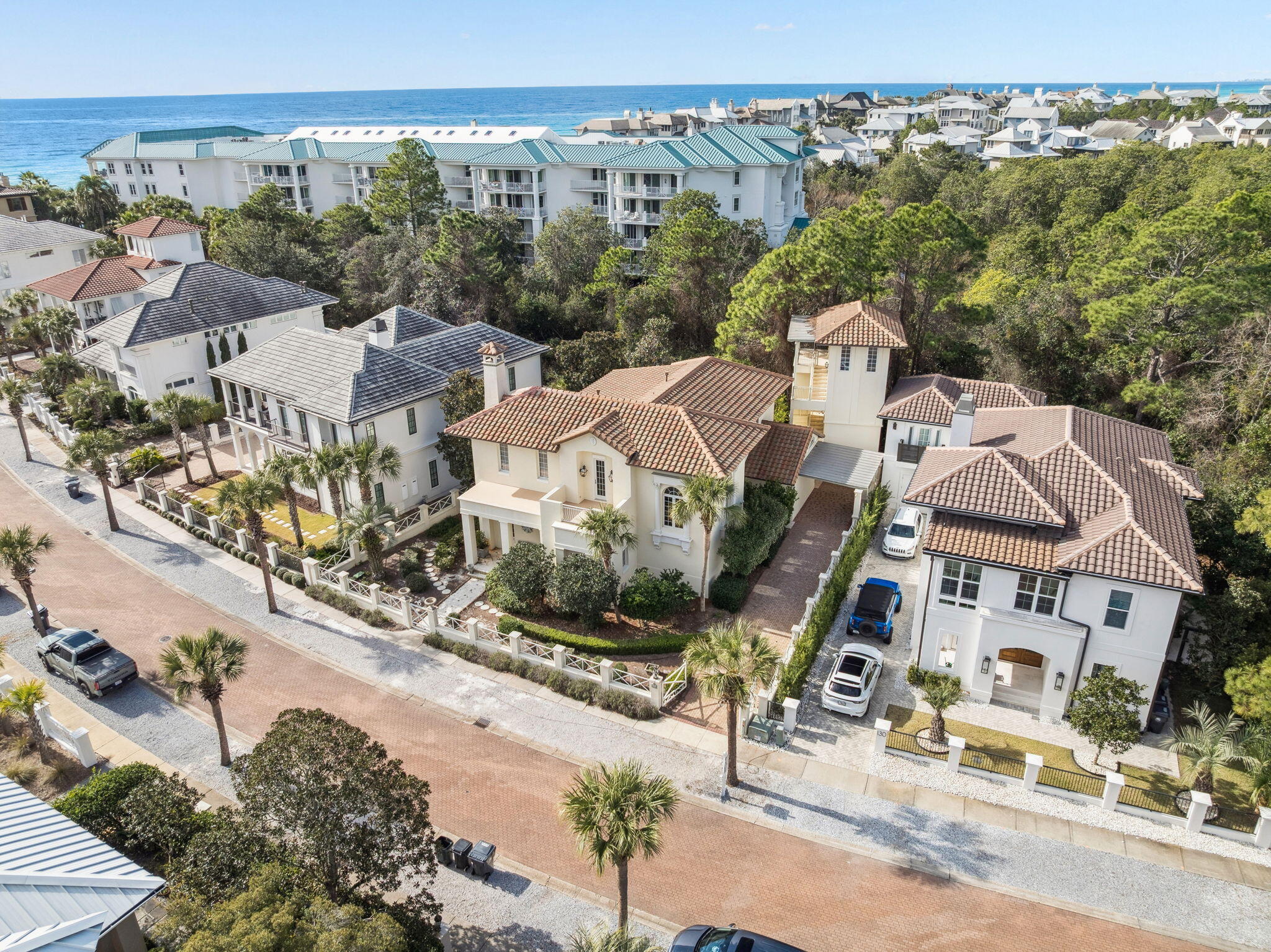 WOW - European-influenced residence with superior ICF-constructed [insulated concrete forms], originally designed by renowned architect Tom Christ. This home artfully marries timeless Old World detailing with the elegance of coastal Florida living. This rental-restricted community offers luxury amenities such as a club house, heated pool, pickle ball & tennis courts, in addition to a PRIVATE BEACH just steps away, complete with a viewing tower. The home is located just 5 houses back from the beach access. The primary suite has a renovated bathroom. New roof appx 6 yrs, 2 new A/C units, glass in most windows replaced. **NOTE: Rendered photos with pool on patio are for illustrative purposes only. Would need approval through the ARC. Steeped in classic graceful arches, beamed and coffered ceilings, and rich hardwood floors create an inviting yet refined ambiance. The thoughtful floor plan encompasses five spacious bedrooms and four and a half baths across approximately 3,700 square feet of meticulously crafted living space.  

Perfectly positioned between the private deeded beach access and the community hub, this exceptional residence offers immediate proximity to sugar-white sands and emerald waters of the Gulf   just a short stroll away through scenic walkovers.  

Step outside to enjoy a beautifully landscaped setting, complete with an outdoor dining area under a pergola and built-in gas grill   perfect for alfresco evenings with friends and family. 

So whether you're seeking serene seaside relaxation, active outdoor living, or elegant indoor entertaining, 152 White Cliffs Blvd embodies the best of 30A.
