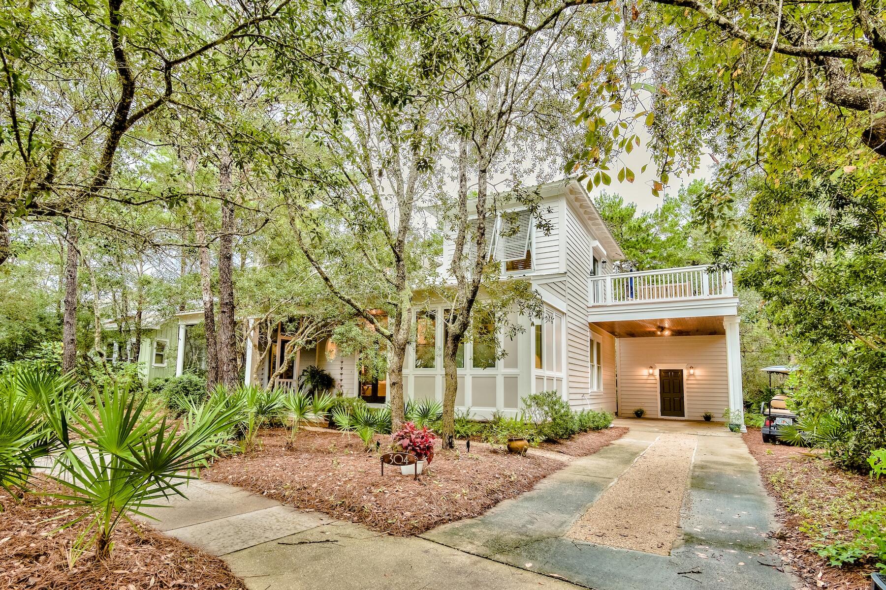 Located in the secluded, Grayton Beach gated community of Lake Place, this unique cottage boasts the perfect location for enjoying the serenity of the Grayton Beach State Park and is a short walk to Western Lake, the beach, boutique shopping and delicious eateries. This home is also close to the community dock, pool and park. The home's open living area walk out screened porch provides a good flow for entertaining while the separate dining room offers an ideal space for intimate dinners. Also on the main floor is a master bedroom with additional large bedrooms upstairs, each with its own private full bath making this home very desirable for guests. 
Lake Place is 20 acre property that borders the state park on the east and to the south is 1,475 feet of lakefront on the globally rare coastal dune lake. Enjoy the serenity of nature and the very best of 30A living.