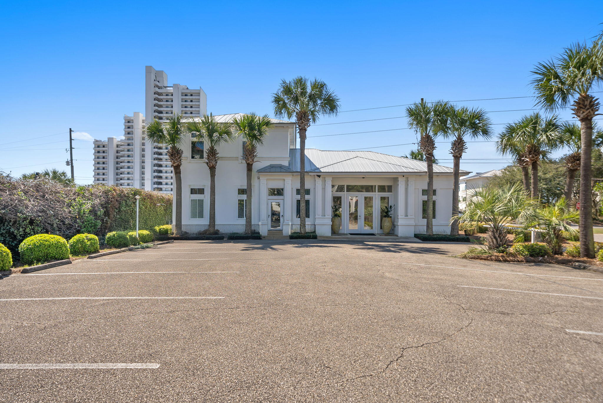 Prime 30A investment opportunity offering commercial office space with eight offices plus a private Gulf-view apartment ideal for owner occupancy or short-term rental income. Located in the heart of Seagrove Beach along scenic 30A, this professional office building, features eight private offices and a spacious conference room. Total office space of approximately 2110 sq. ft.  Above the office space is a beautifully appointed 2-bedroom, 1.5-bath apartment, approximately 674 sq. ft, with a private entrance and balcony offering stunning Gulf views. Positioned directly across from the beach, this unique mixed-use property also includes 14 parking spaces--an exceptional amenity in this highly desirable coastal location.
