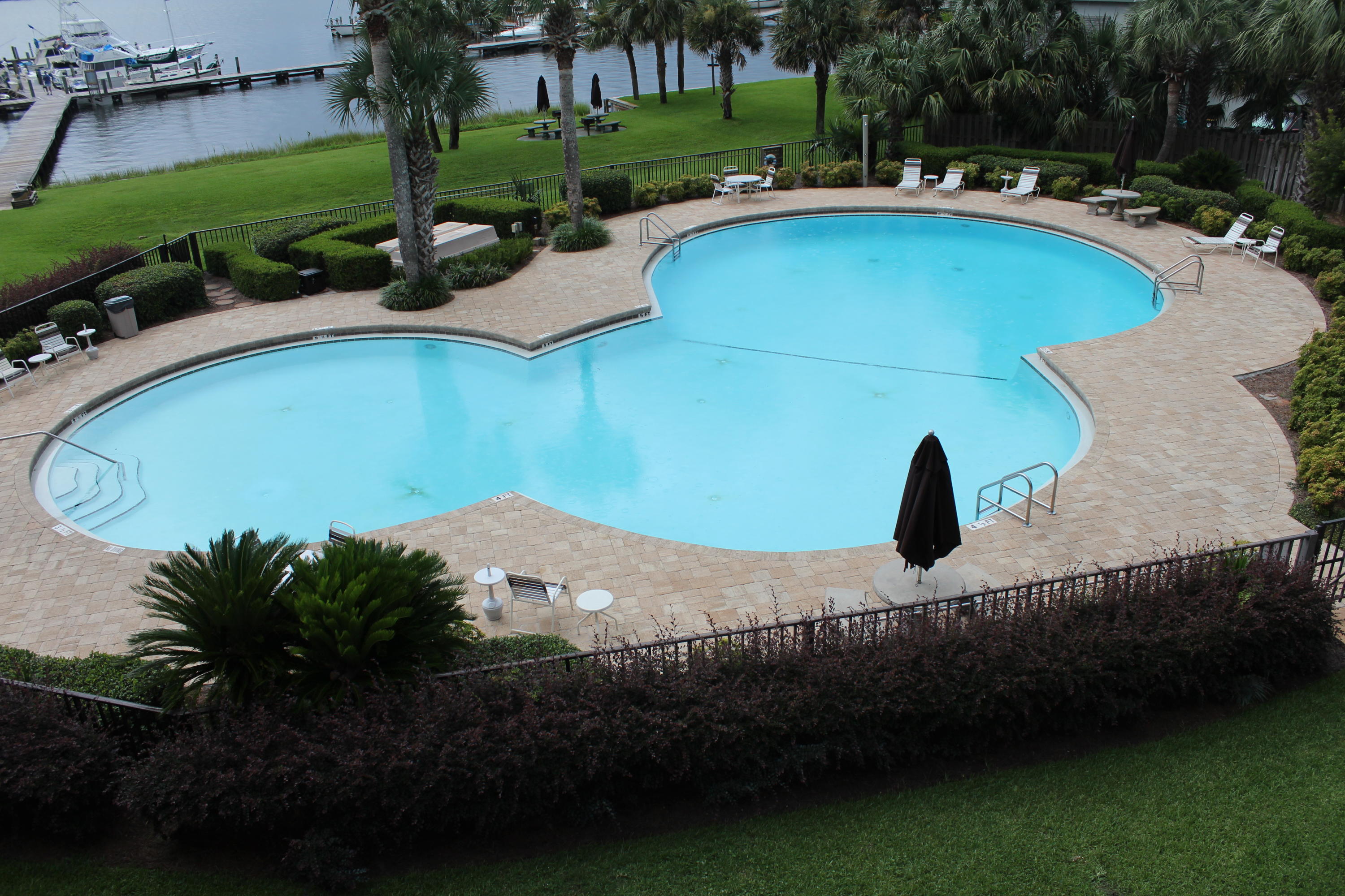 A fantastic 3rd Floor Waterfront Studio Condo having a VERY LARGE 46ft, Boat Slip Assigned, Slip #A08. Nicely updated, and furnished, move-in ready for your personal or family use. OR, use it as a second home, and rent it out when not using it personally. The Complex amenities are: Two Super Large Fantastic Pools; BBQ Grills & Picnic areas; Marina/Docks with your own Assigned Boat Slip.. and walk the Docks for exercise, or feel free to fish (with an appropriate License); Close to Restaurants, the Mall, the Beach, and more.. All within very few minutes. Rather hard to beat the value anywhere in the local areas. Inventory is the lowest it has ever been for a really long time.. Don't procrastinate.. Call today. Oh, by the way, the dues cover the following: Water; Sewage; Trash; Quarterly Pest Service; Cable TV w/2-HBO's; Hi-Speed Internet (wireless); Maintenance of the Buildings Exterior; Grounds; Pools; and Marina; Insurance on the Building Structures; and all required Association Insurance coverage's; as well as Association Management expense, and more..

We are no longer permitted to call it a (1) one bedroom unit per our MLS System... but it sleep 4-easily!!