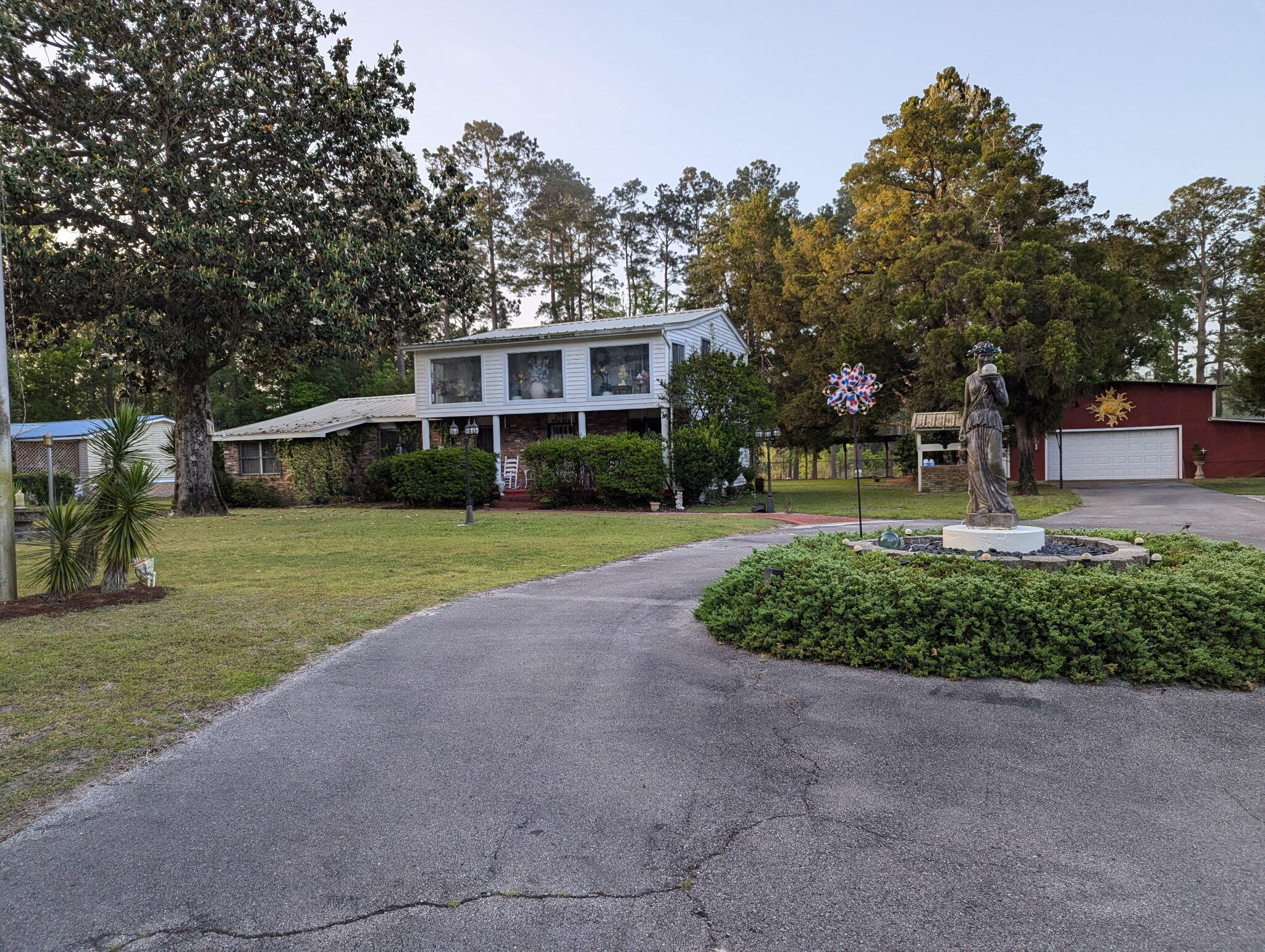 If you are looking for just the right property, this could be it!! An older home situated on 3.65 acres, with endless possibilities.  3 bedrooms, 3 baths and  with a guest house, garage with loads of work space. The gazebo offers a quiet space for the outdoor enthusiast! Seller is a licensed Real Estate Broker in another state.
Property to be sold AS IS, Cash, Rehab/Construction Loan, Line of Credit
