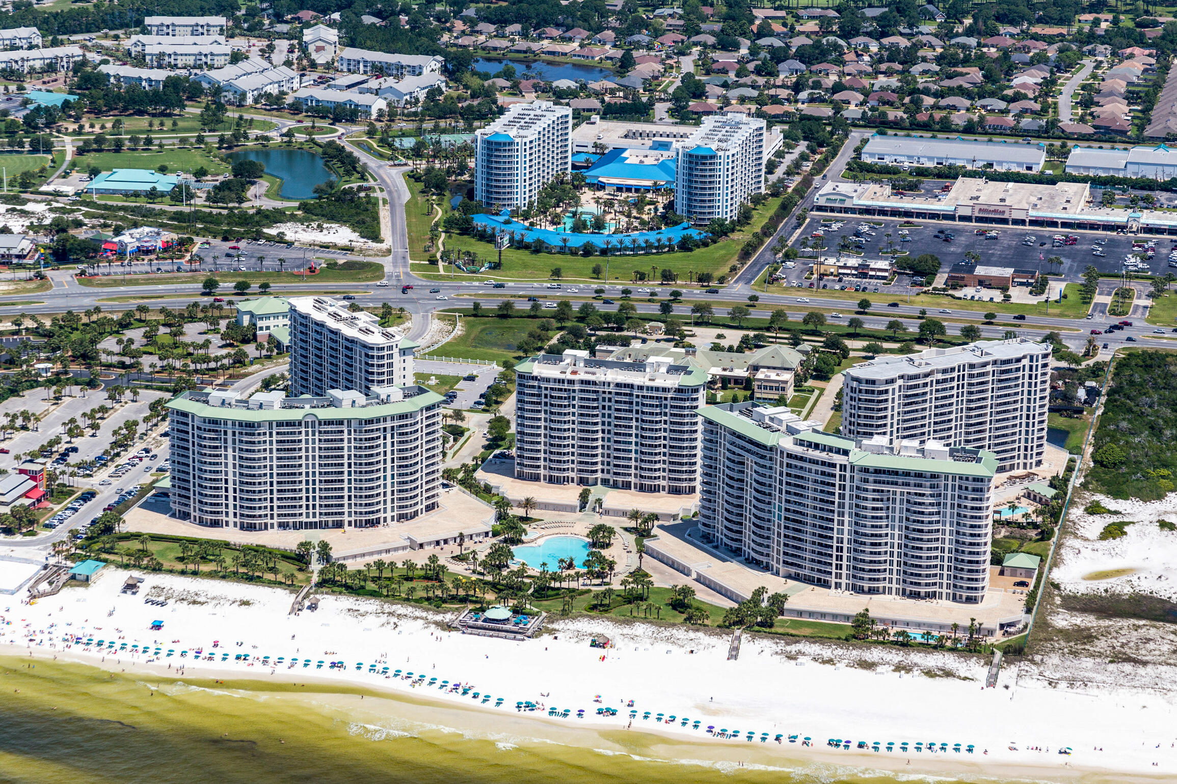 GULF VIEWS + POOL VIEWS! Welcome to the best priced unit at the private + gated beach community - The Palms of Destin! This 6th floor unit has an expanisive private balcony that overlooks15 lush acres and leaves NOTHING to be desired. The chef's kitchen boasts endless ranite countertops, stainless steel appliances, storybook white cabinetry, a customer backsplash + more. The 11,000 square foot, 259,000 gallon zero entry pool is Destin's largest lagoon pool! You'll be blown away by the 5 dancing waterfalls, walking bridges and spacious lounging area. There's a 21,000 gallon heated pool, children's splash area, whirlpool spa + so much more.
The Palms of Destin Resort features a 2,265 square foot state-of-the-art fitness center. The HOA fee covers ALL your utilities! Don't Wait....