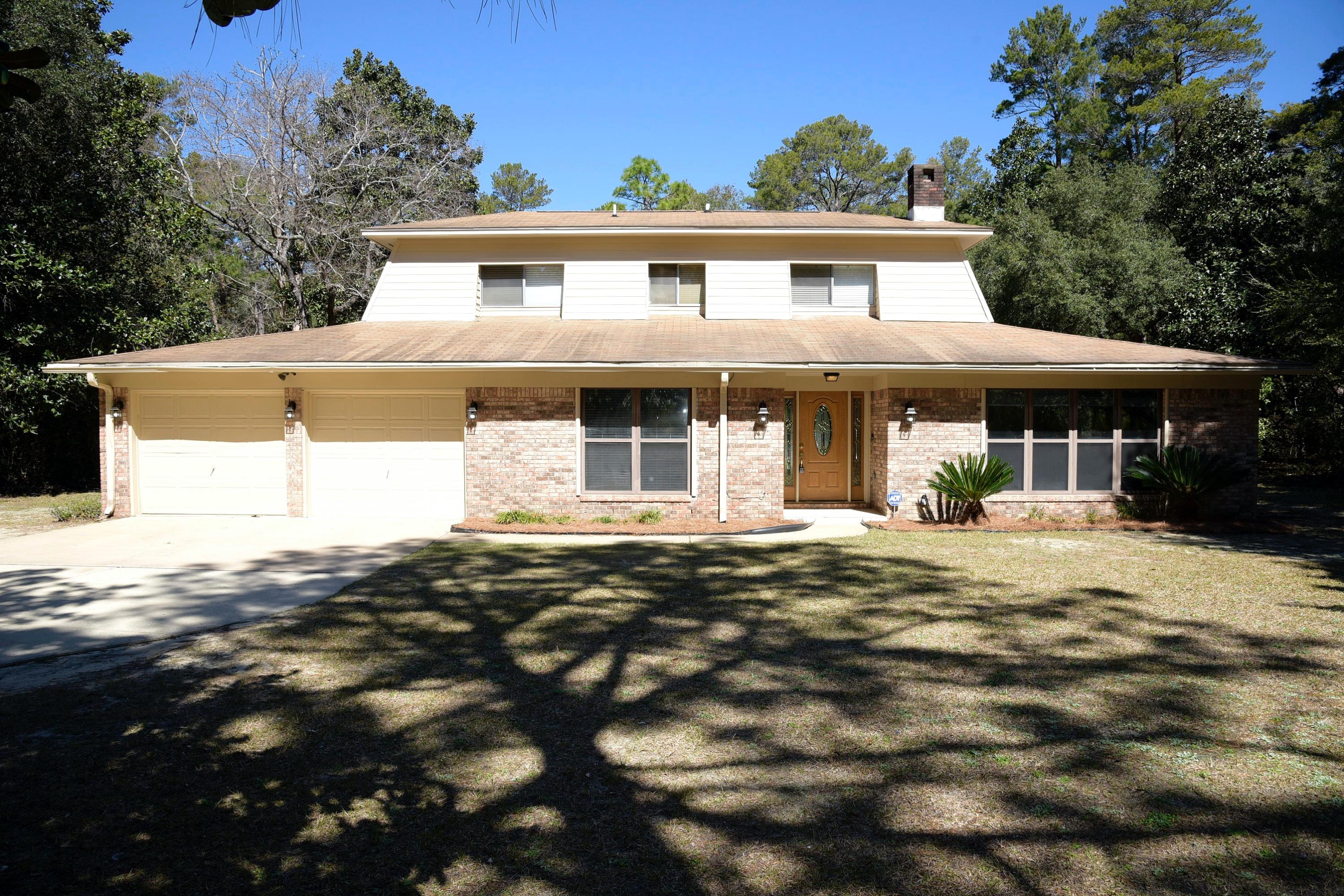 Enjoy the private setting and this beautiful home located in desirable Rocky Bayou area. This home boast a large yard and surrounded on two sides by a lush greenbelt. Spacious kitchen offers a built in bookcase, pantry, tile flooring, lots of cabinet & counter space and overlooks the beautiful backyard and sparkling pool. Charming Breakfast area has room for a hutch or sideboard plus a family size dining table. Master Bedroom is on the first floor as well as the second bedroom and bath. Upstairs features two bedrooms & full bath upstairs. Laundry room is conveniently located downstairs. Double sided brick fireplace opens into the great room area on one side and the family room on the other. Follow the paver sidewalk to the fantastic family inground pool which is   completely fenced. The two exterior sheds are perfect for all your lawn and pool supplies. The backyard offers plenty of room for many sports. The zoned sprinkler system uses city water. Owner provides pool service. Sorry NO pets & NO smoking! Any person 18 years old or older must complete separate applications. Tenants required to carry Renter's Liability Insurance while residing in the home.