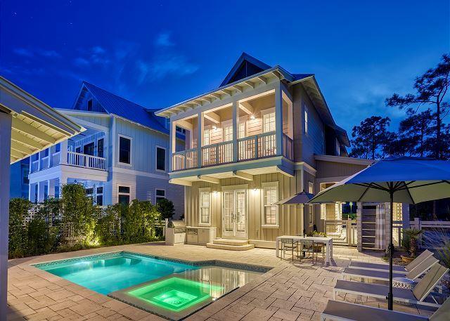 This elegant home has a contemporary coastal design throughout and situated on an over-sized lot in Watercolor with a large pool spa, sunbathing area & covered outdoor TV space complete with gas lanterns & firepit.  The large lot allows for a detached garage and covered parking. The interior has an open living area alive with natural light. There is also a bunkroom on the 2nd floor. Sold furnished.