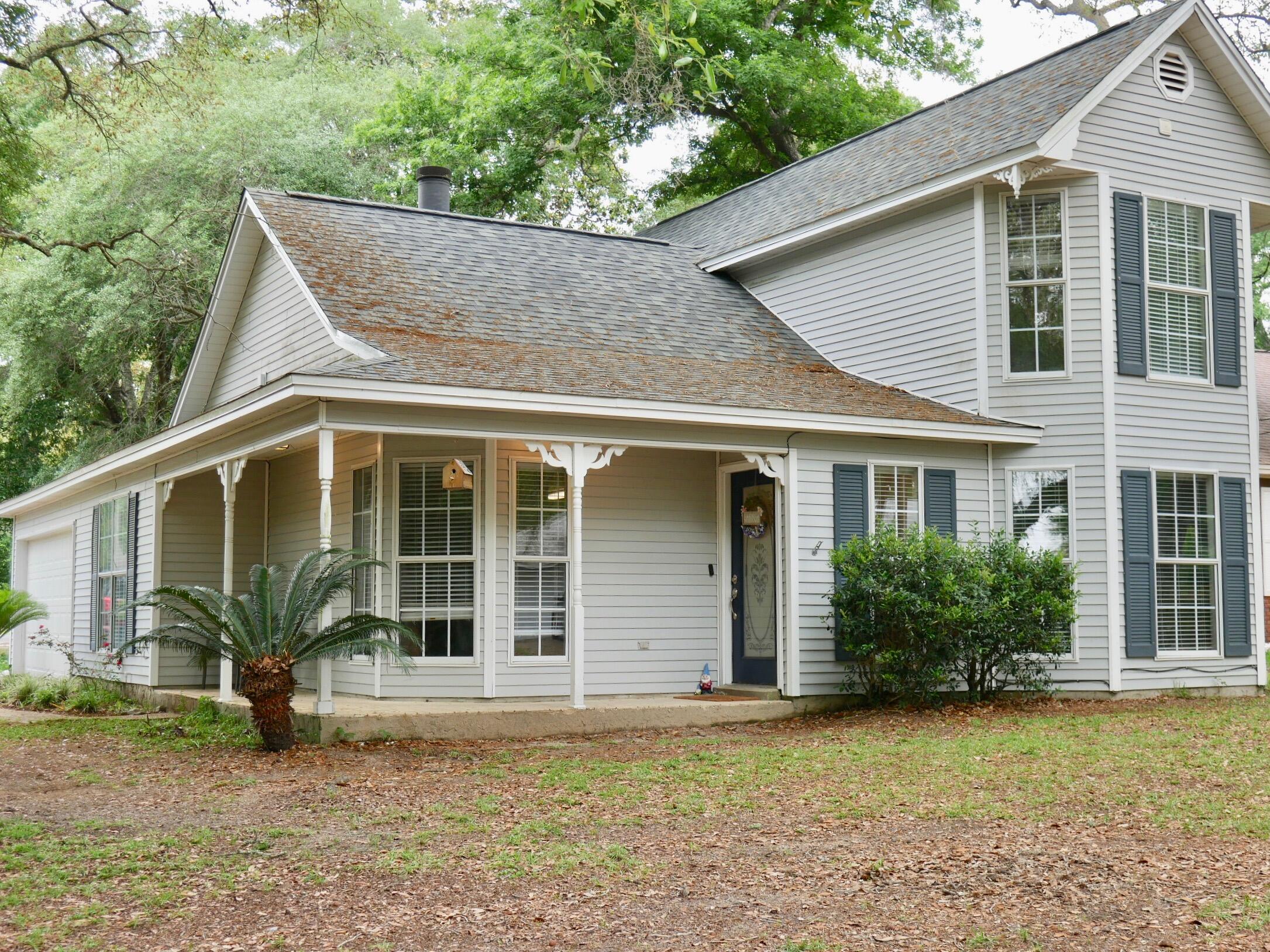 Charming Victorian style home on a quiet street centrally located in Niceville by schools and shopping! This low maintenance vinyl home sits on roomy .23 acre corner lot with a fenced back yard, perfect for kids and pets. The family room is open to the dining area that has a pass through to the nicely appointed kitchen. The master bedroom and bath are downstairs and there are two additional bedrooms and another full bath upstairs. Additional noteworthy items include 2018 LVP flooring in living areas, 2018 roof, 2014 Furnace, 2011 compressor and a new water heater will be installed prior to closing. You don't want to miss this one because it will sell FAST!