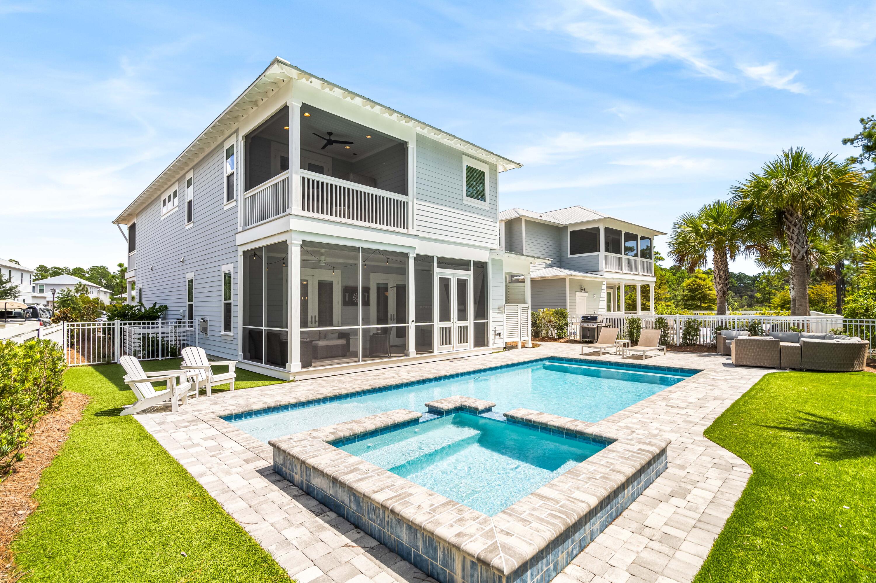 WELCOME HOME to your coastal oasis in desirable NatureWalk at Seagrove.  This enchanting home has it all. Luxurious indoor and outdoor living at its best!  Step into the open living space with living, dining, kitchen all surrounded by sunlit spaces. Sunny living room has stunning beams, fireplace, v-groove trim.  Gourmet kitchen with quartz counters, exquisite lighting, huge pantry. Step onto 1 of 3 screened porches out to your lush tropical paradise with large, heated saltwater pool and hot tub, fire pit.  Nature preserve at rear provides privacy and serenity.  Perfect home for living or rental investment. 1st floor bedroom & full bath. Owner's suite upstairs features balcony, tub, separate shower, 2 separate vanities, walk-in closet. Start living your DREAM where every day is a weekend! In addition to the first floor bedroom with full bath, upstairs features 3 additional bedrooms.  Added bonus living area on second floor offers great space for children to enjoy.  Primary owner's suite features tray ceiling, double door entry, cozy private balcony.  Luxurious master bath has soaking tub, walk in shower, 2 separate vanities, walk in closet.  Home features 4 porches, 3 of which are screened.  Beautiful veranda welcomes you with outdoor sleeping porch swing...perfect for relaxing.  Or spend the afternoon enjoying your splendid pool and spa. Outdoor living at its finest!  
A covered bridge marks the entrance into NatureWalk at Seagrove, which was designed as a charming residential enclave to include Americana styled home designs that evoke a warm feeling of bygone golden years. Paver stones are used for walkways and drives that lead up to homes with verandas that span their width. The center of NatureWalk is called "The Gathering Place" and features a large refreshing zero entry swimming pool and a hot tub. There is also a children's pool with sunshade and a long lap pool available for avid swimmers. A spacious patio beside the pool is adorned with tropical palm trees that rustle serenely in the breeze. A large pavilion nearby has an entertainment bar where folks gather to enjoy their own favorite tropical drinks. The patio includes tables, chairs, and gas grills so that families may enjoy having their poolside cookout with close friends. A "Tot Lot" provides a fun playground for kids while their parents may enjoy a grassy putting green nearby. NatureWalk's awesome location is a short bike ride away from the sparkling crystalline white beach and jewel toned waters of the Gulf.
 NatureWalk has 2 pickle ball courts, basketball courts, sand volleyball court, fitness trails with exercise stations, walking paths, and an easy biking path to the beach. The perfect location of this community gives you peace and tranquility for your home while being just minutes from all the fun and activities of Scenic Highway 30-A including dining, entertainment, shopping at Seaside, WaterColor or one of the many nature areas including State Parks, Coastal Dune Lakes or riding your bike on the pedestrian path. 
NatureWalk is filled with nature trails that lead you throughout the community and direct you right to the beach, with a bike/pedestrian trail that leads to the emerald waters of the Gulf and the sugar white sands with all of nature's glory.  
All information deemed correct but should be verified by buyers.