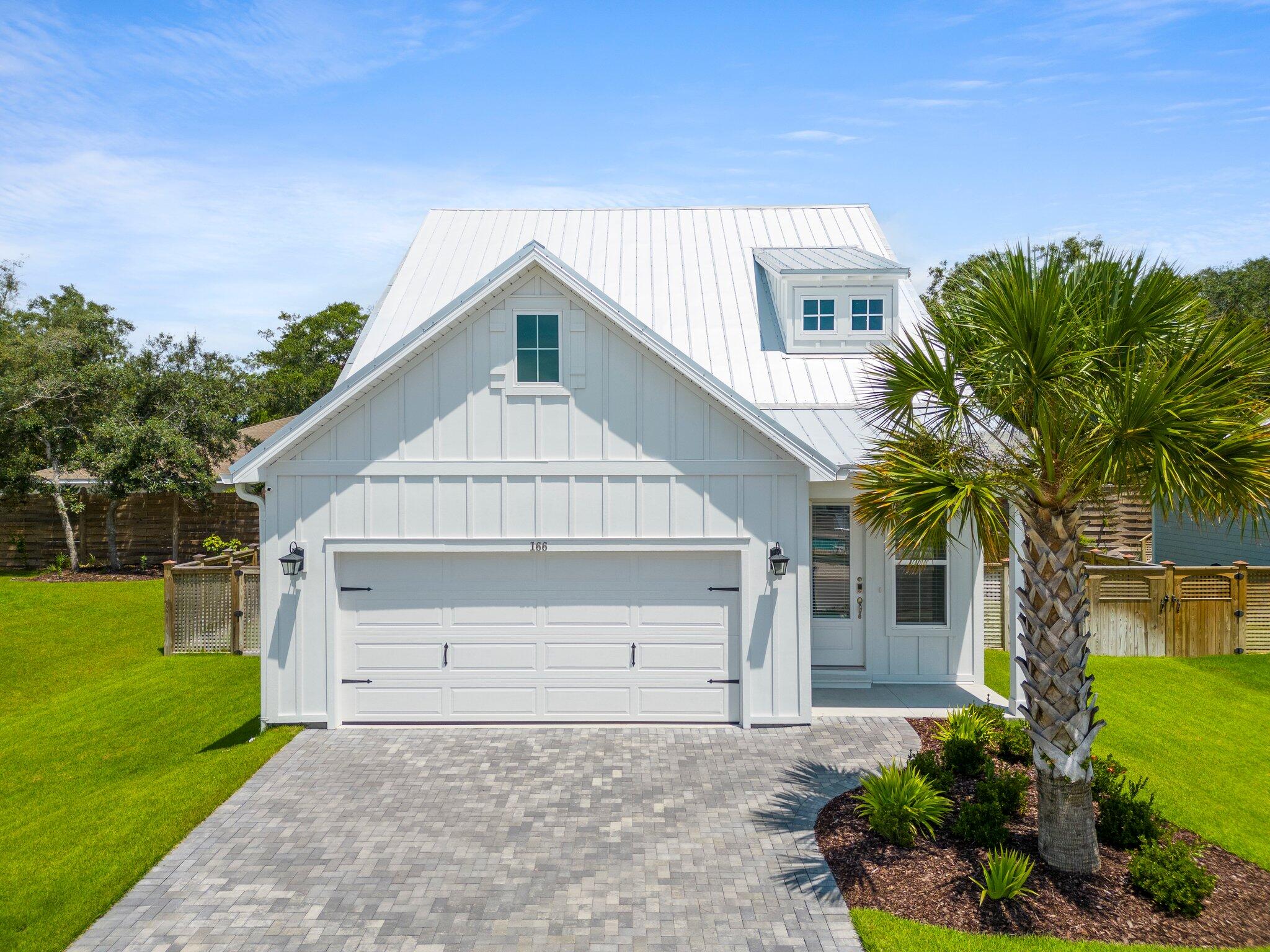 Indulge in coastal living in a meticulous, craftsman-style home, completed in 2021. Set in Santa Rosa Beach, not far from the renowned Scenic Highway 30A, this 4-bed, 3.5-bath gem seamlessly blends contemporary design with coastal charm. Enjoy an open layout, stunning kitchen with stainless steel appliances, natural gas stove, quartz counters, and shiplap accents on the center island. The master suite offers tranquility with en-suite bath, dual vanities and walk-in closet. Upstairs, find 3 more bedrooms and modern bathrooms. Located, near a regional hospital, Scenic 30A's beaches, shopping, and dining. Community amenities include a dock ideal for fishing or launching a kayak and pool to keep cool on those warm Florida days. Video cameras and flower pots in backyard do not convey with home
