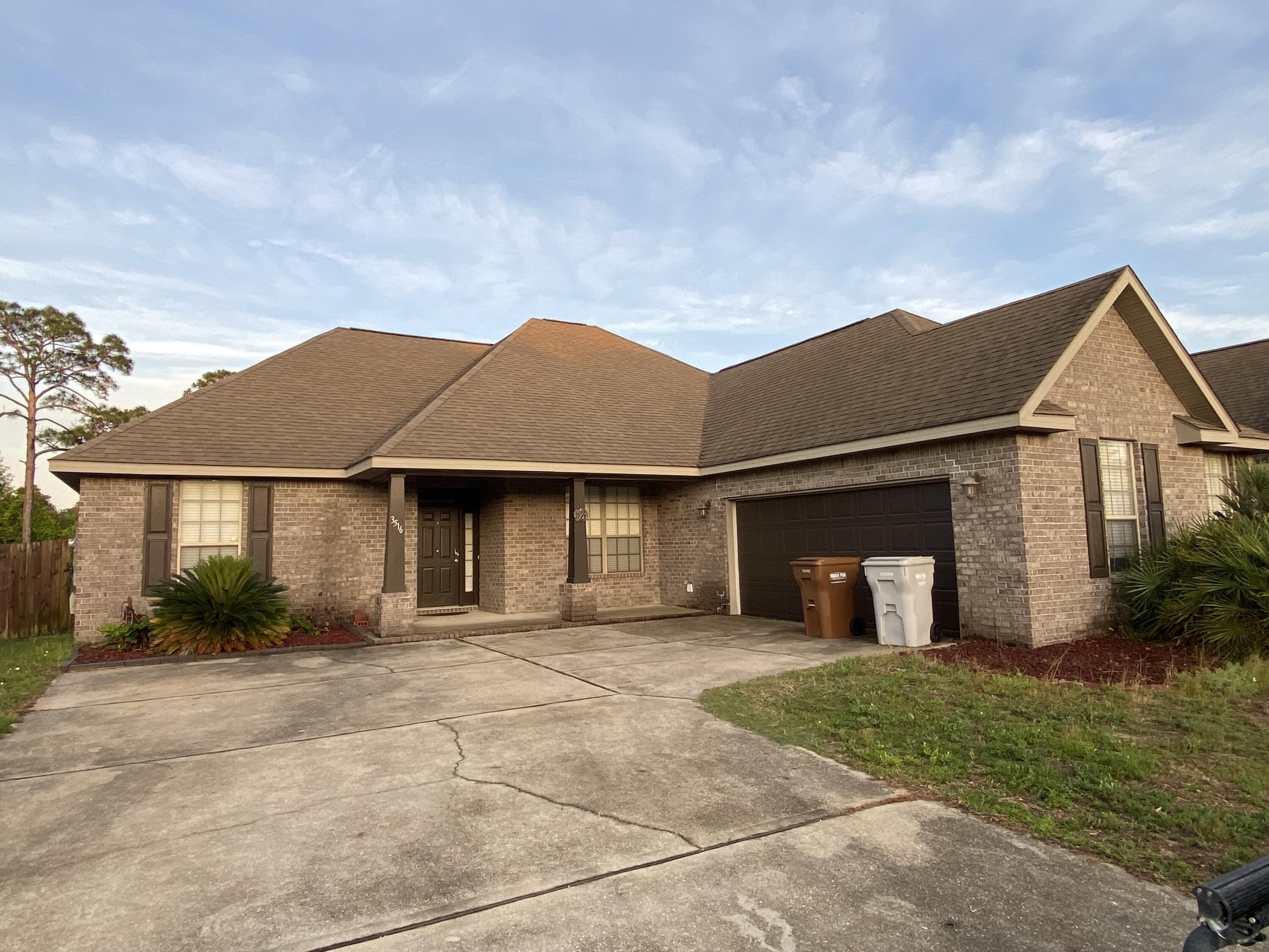 Drive by and see this nice home available now for move in! The front of the house has a side-entry garage, the backyard has a privacy fence and patio. The open floor plan and high ceilings create a spacious area in the living room with a dinette area off the kitchen and a formal dining room or could be a home office space in the entry. The kitchen has a breakfast bar and overlooks the living room. Split floor plan with plenty of walk in closet space in each bedroom!  Easy access to Interstate 10 and 98.  Drive by, call to see inside!