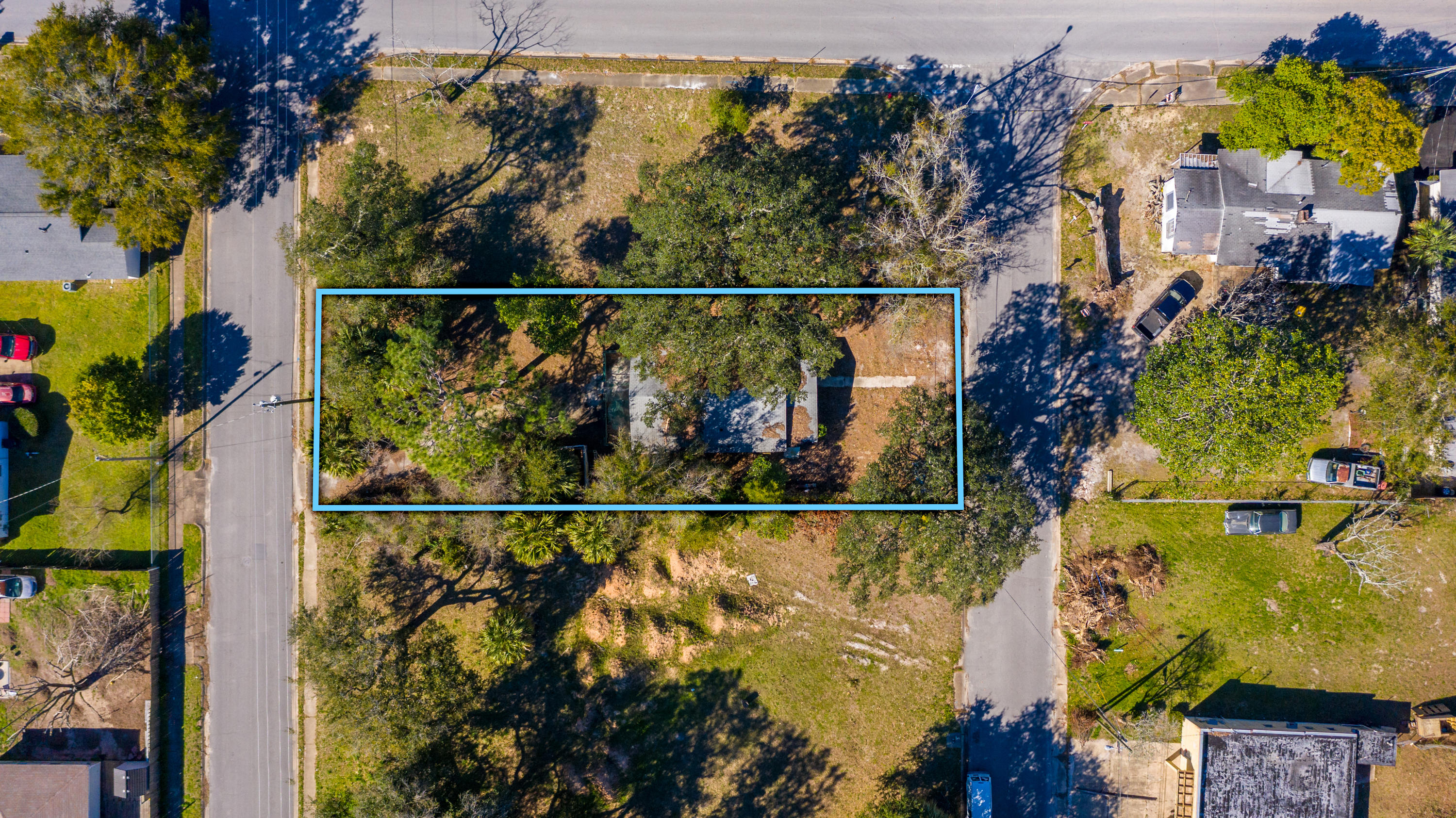Multiple Offers Received! Highest & Best OFFER DEADLINE of MONDAY MARCH 15th 12pm. Fix & Flip or tear down and build. This small bungalow style home is 71 years old and could be a neat home if saved and rebuilt. The lot can also be split into 2 lots! It runs the width of the block so it has road access on the front and back. It is 150 feet in depth and could be split to make 2 lots that are 75x50 each. Current zoning is singe family residential and will remain that way as long as the house is fixed and flipped. If it is torn down, then the zoning becomes commercial. The value is in the lot. It may be possible to file a variance and get the zoning changed to multi family low density.There is no guarantee, but explore the option with the City of Ft Walton Beach. Great central Fort Walton Beach location just off Eglin Pkwy and Hollywood blvd and 1 mile to downtown Ft Walton Beach. Surrounded by many old oak trees and on a quiet street surrounded by businesses and some nearby residential. AS-IS CASH BUYERS ONLY.