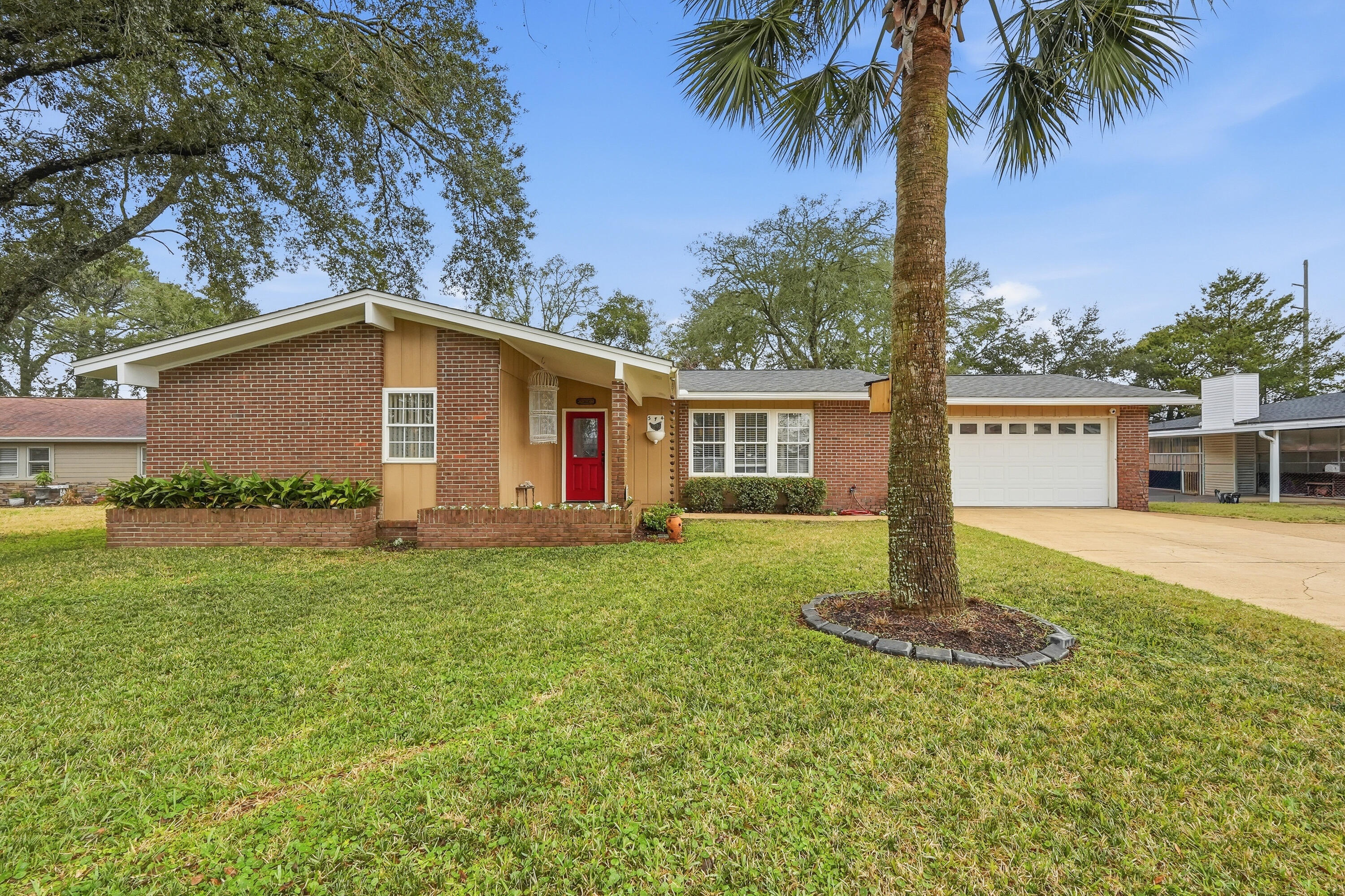 SELLER OFFERING $5,000 to be used towards buyers closing costs, prepaids and/or rate buy down. This timeless 3 bedroom 2 bathroom brick house welcomes you home with its beautiful mature trees, landscaping & inviting front porch. There is an open floor plan with luxury vinyl plank flooring throughout and beautiful granite countertops in the kitchen with upgraded cabinetry providing ample storage. Off the main hallway toward the front of the home is the primary bedroom with double closets & an ensuite bathroom with linen closet. From the living room, step outside to enjoy the screened-in porch and spacious backyard with a large climate-controlled storage shed & chicken coop (can convey, if desired). The oversized garage includes a workbench and built-in cabinets that will stay with the h This home has had many upgrades and has been well-maintained, move-in ready, just waiting for you!

Roof was replaced in 2024, HVAC 2023, new insulation blown in entire attic to include the garage in 2025, the storage shed was insulated & window AC unit added in 2025. Chicken coop in backyard may convey or be removed.