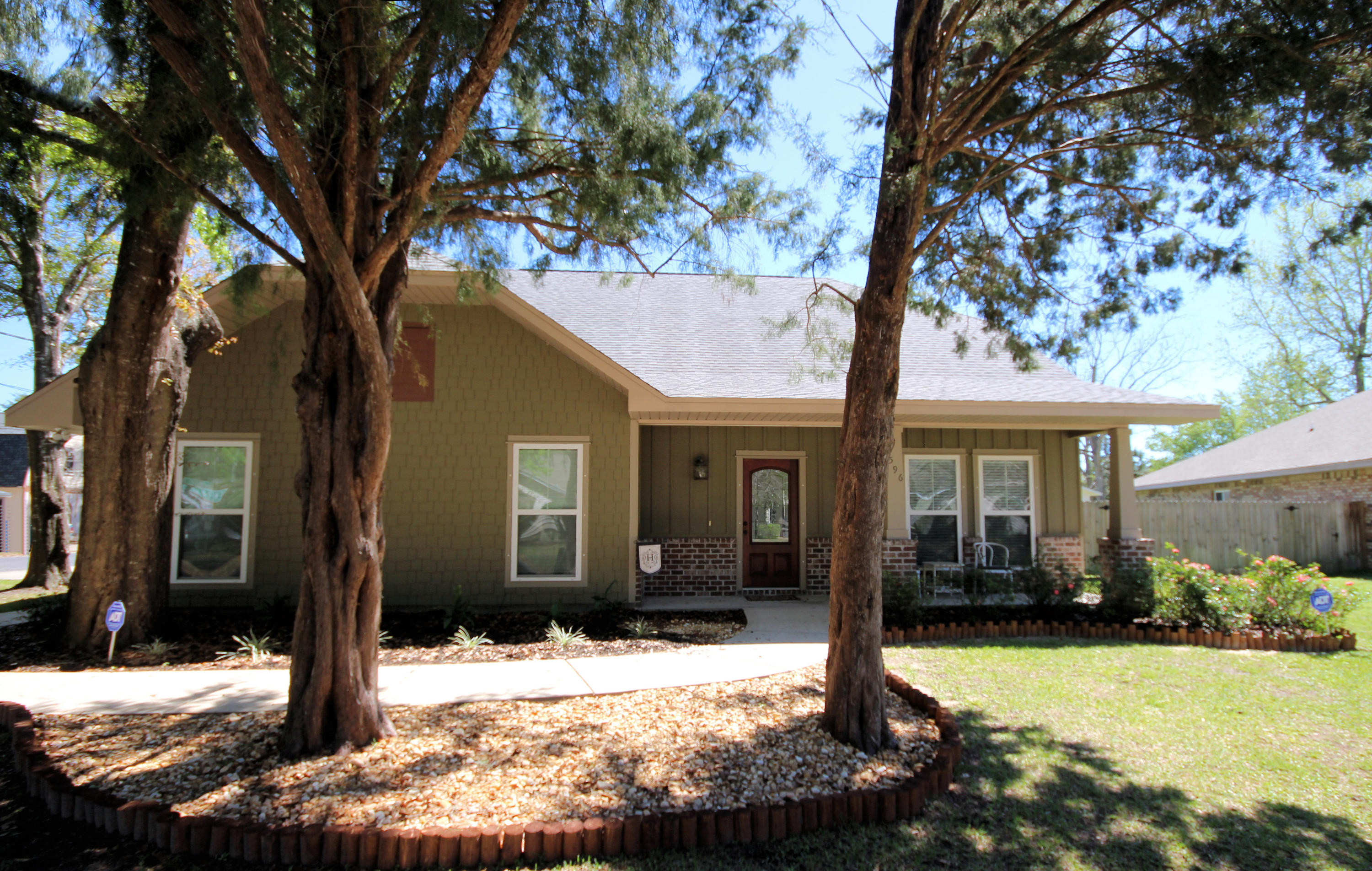 Gorgeous 4 bedroom home close to Hurlburt, Eglin, shopping and beaches. Gourmet kitchen boasts custom maple cabinetry with crown moulding, granite countertops, glass tiled back splash, high-end stainless appliances, an island and a spacious breakfast bar. The butler's pantry is complete with a wine fridge connecting the kitchen and dining room. The massive master bedroom suite is an amazing retreat. The master bathroom has a Jacuzzi tub, double bowl vanity with granite top and a large walk in closet. Beautiful wood flooring, raised ceilings, crown molding, and custom milled window and door casings throughout the main living areas. The upstairs has three bedrooms with large closets and two full baths. The large privacy fenced back yard is perfect for entertaining, room for a future pool.