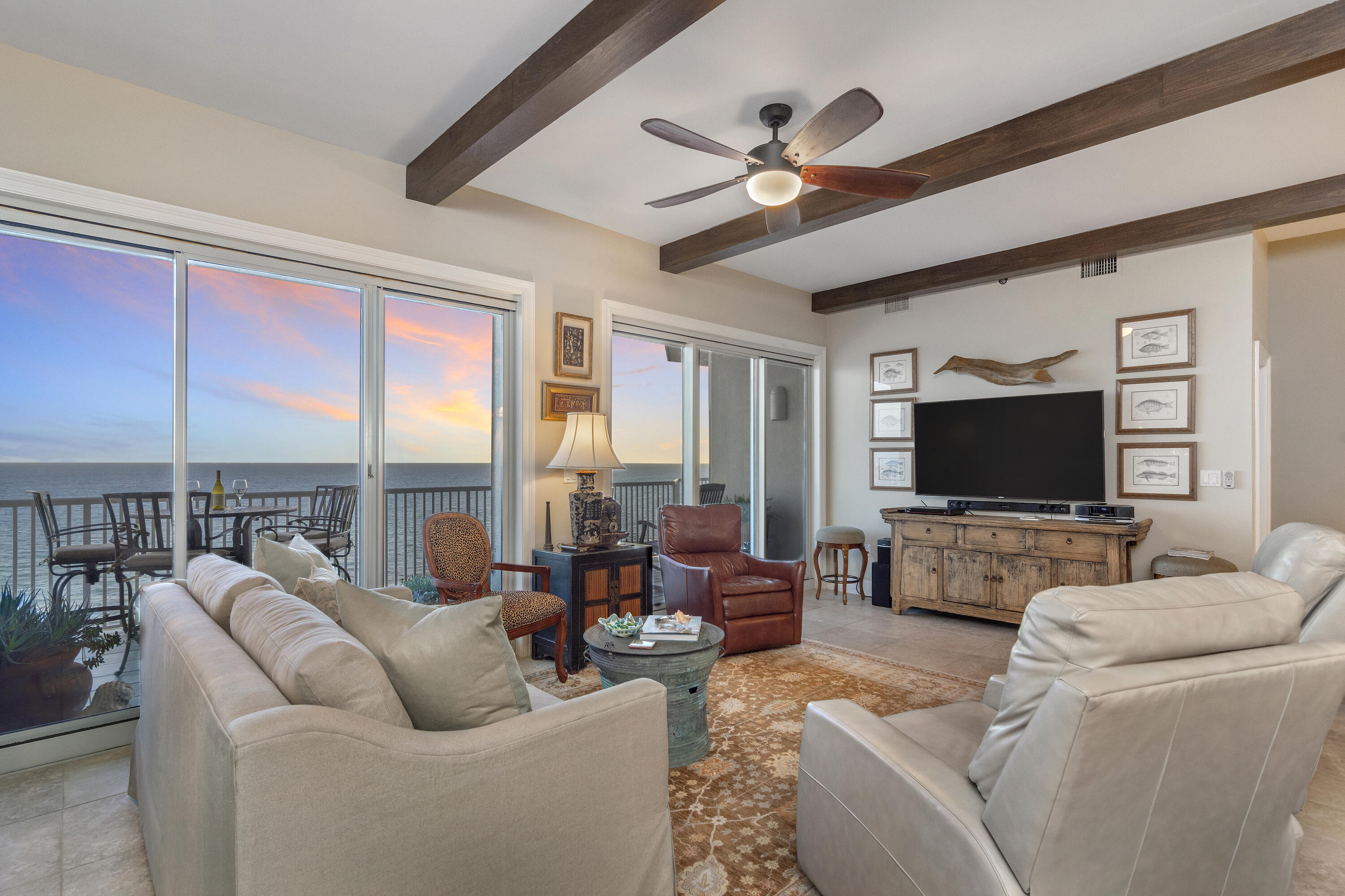 Priced below current appraisal!!Experience awe-inspiring 180-degree unobstructed beachfront views along the entire coastline from Destin to Panama City from  the 50-foot balcony of this 11th-floor corner unit! Nestled within a gated enclave, this luxurious condominium seamlessly melds comfort with sophistication.Featuring upscale touches such as authentic wooden beams gracing the ceilings,stone fireplace & accents,and bespoke solid wood cabinets crafted by a master cabinet maker, this distinctive open floorplan ensures water views from every room.With 10-foot ceilings and two separate living areas, revel in the luxury of two master suites both offering Gulf views and access to the expansive 50-foot Gulf-view balcony.A third ensuite guest bedroom adds to the allure,while a second generousl north facing terrace provides stunning vistas of the pool, lake, and bay, creating an ideal setting for al fresco dining. This property truly epitomizes the concept of a "Home on the Beach." The Empress is a boutique, luxury gated community consisting of only 44 units located directly across from 2,000 feet of sugar white beaches and although 14 of the units are allowed to be vacation rentals, for most owners The Empress is a full time residence or second home. Other features that make The Empress so desirable are the semi private elevators that open into a foyer shared by only you and 1 neighbor, large climate controlled storage for each owner, a more private pool and hot tub overlooking the lake and fitness room, HALO water system, fiber optics cable, full time maintenance staff, security, and the famous Whales Tail beachfront restaurant within a block for food and beverages on the beach. Walk out the door to the beach or pool, relax on one of your balconies, or experience the great entertainment, shopping and restaurants all within a short distance. Now is the time to make your dream of living at the beach a reality. (The Empress passed its required Milestone Inspections with flying colors!)