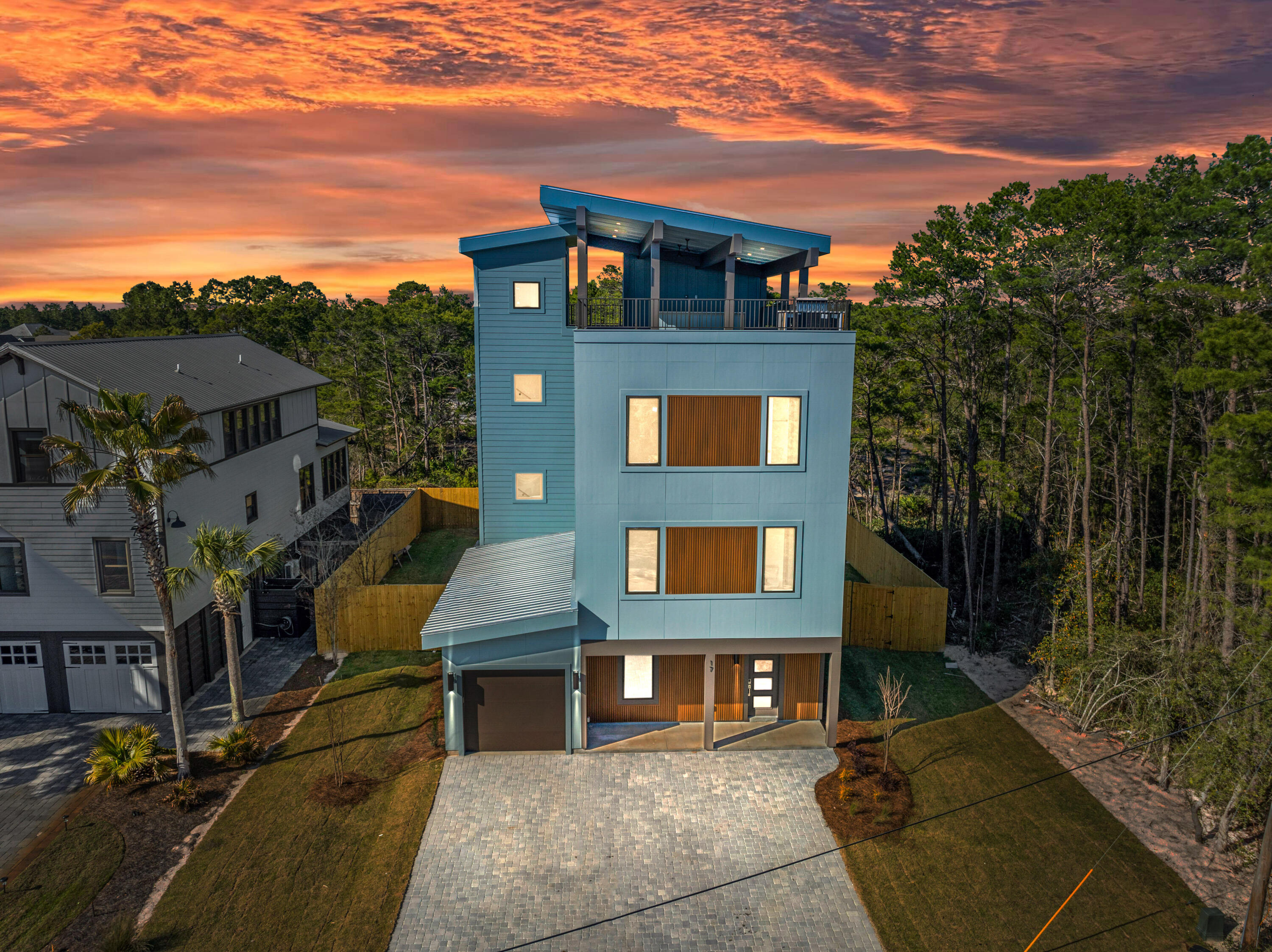 Welcome home to this spectacular 6-Bedroom New Construction Beach house with rooftop Terrace overlooking protected state park and your private outdoor pool! As you step inside, you'll be greeted by a light-filled open-concept living area that seamlessly blends modern luxury with beachside charm. The spacious living room features oversized windows, 10' ceilings, designer light fixtures, and SOHO LVP. The kitchen boasts Quartz countertops, luxury appliances, and Designer chimney hood. Each bedroom is thoughtfully placed throughout the home and have their own en-suite bathroom. The 3rd Floor gameroom/ bonus space is equipped with a wetbar and allows quick access to the approx. 1400sqft of rooftop outdoor entertaining space! Elevator access to all floors of the home including rooftop terrace. The rooftop deck is reinforced for a hot tub, and a luxury outdoor kitchen is available. The SkyBlu plan offers 3 levels of refined luxurious living with upscale interior finishes and features including Quartz countertops, GE Profile appliances, elegant flooring and lighting options, a garage and ample front parking. Make this paradise yours and start enjoying the good life.

Located in the heart of Blue Mountain Beach, this spectacular beach house comes with an enviable lifestyle. Gulfview Heights beach access is 0.7 miles away and has abundant parking and restrooms. Gulf Place Town Center offers boutique shopping, restaurants and live entertainment nearby while popular eateries including Basmatis and Local Catch are within strolling distance. With no HOA and no maintenance for the foreseeable future, this superbly located beach house is the ultimate primary or second home in a neighborhood that's ideal for vacation rentals.

Prices, plans, features, and options are subject to change without notice. Additional restrictions may apply. Square footages are approximate. Home information including features and available options are subject to change. Artist renderings, photos, colors, features and sizes are for illustration purposes only and will vary from the homes as they are built. Elevations, exterior/interior colors, available upgrades, options, and standard features may vary and may include select options, elevations, and upgrades that require an additional charge. School zoning is outside of BluScape Homes' control and is subject to change at any time.
