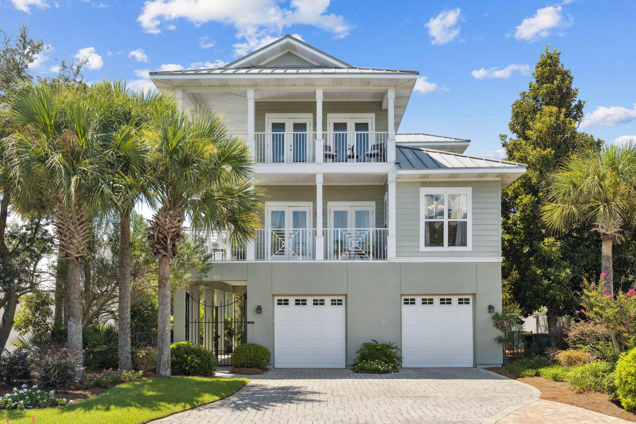 Welcome to your coastal retreat in the gated community of Destiny, just a short distance from the beach. This custom 4-bedroom, 3.5-bath home is ideal as a short-term rental or second home, offering comfort, style, and strong income potential. A private guest suite with its own entrance, kitchen, and living area is perfect for visitors or rental flexibility. The second floor features an open layout with a well-equipped kitchen, living room, balcony, and two bedrooms, while the third-floor master suite provides privacy, balconies with water views, and abundant space. The fenced backyard offers room for a pool and expanded outdoor living. With rental projections around $80K annually and sold mostly furnished, this move-in ready property is a smart investment and a true beachside escape.