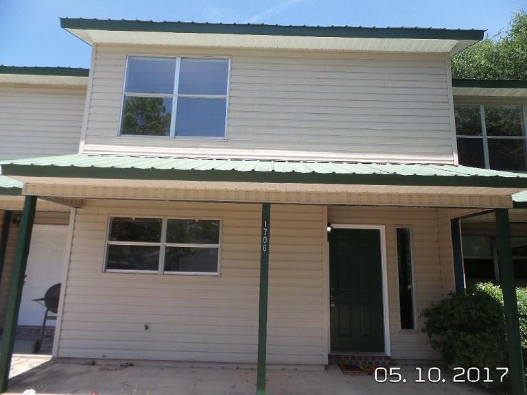 Nice roomy townhome with fresh paint, new blinds, new light fixtures, new carpet, new stove and fridge, Full bath upstairs has Hollywood entrance. Fenced back yard and inside laundry area. Must see!