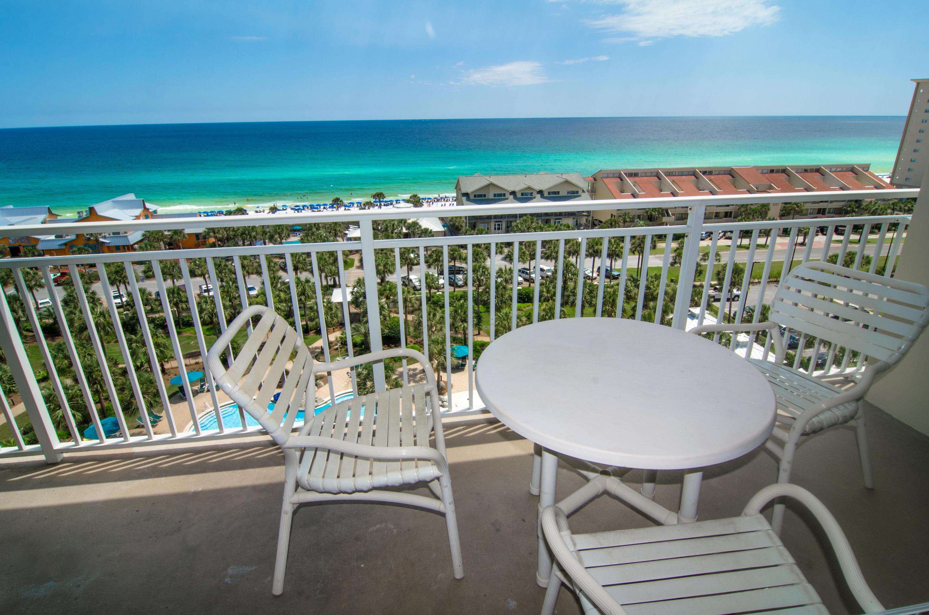 The beach getaway you've been dreaming of...a 2 bedroom, 2 bath condo + deeded parking space + deeded storage locker at Sterling Shores with seaside inspired interiors. Sunshine and warm gulf breezes and views abound from the balcony, accessed from both the living room and the master suite. The gourmet kitchen features loads of cabinet space, stainless steel appliances, Corian and a large breakfast bar. This is a prime west end location in the building with extra side windows in the bedrooms and overlooks the pool and Gulf! This condo also has storm shutters and surround sound speakers in the living room and bedrooms. Enjoy the good life at Sterling Shores...4,300 sf lagoon-style pool, private Gulf-front beach club with heated oasis pool and bar & grill; 400 foot beach, 42-seat surround-sound theater bbq grills and picnic area, 9-acre gated grounds with lush tropical landscaping, free in-room and theater movies, high-speed internet access, seasonal children's program and beach rental service plus on-site rental management.