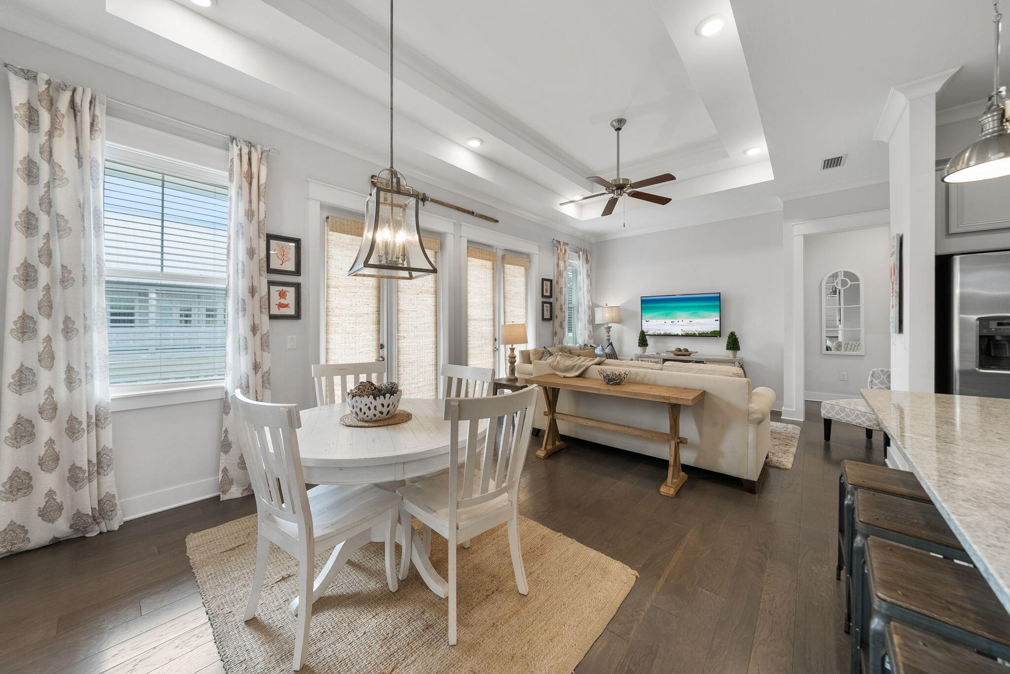 Experience the ultimate 30A lifestyle in this exceptional 2-bedroom, 2-bath C unit located in the highly sought-after Prominence community. With $60K proven rental income and a prime location, this property combines financial opportunity with coastal luxury. Featuring 10' ceilings, an open-concept floor plan, and an abundance of natural light, the home feels bright, airy, and welcoming from the moment you step inside. The gourmet kitchen boasts stainless steel appliances, generous counter space, and seating for up to eight, perfect for both intimate dinners and entertaining guests.
A spacious master suite is equipped with a king-sized bed, private en suite bath, and walk-in closet, while the guest bedroom offers a comfortable queen bed and easy access to the second full bath and porch. The gourmet kitchen boasts stainless steel appliances, upgraded quartz counters and gas cooktop. A spacious master suite is equipped with a king-sized bed, private en suite bath, and walk-in closet, while the second/guest bedroom offers a comfortable queen bed and easy access to the second full bath and porch. Prominence offers TWO resort-style pools, picnic area/outdoor grills, and an unbeatable location just across from The Big Chill, where you can enjoy dining, shopping, live music, and family-friendly events. This property is also a proven rental income machine generating over $60K annually, making it an ideal choice for investors, vacation homeowners, or full-time residents. With its prime location, upscale finishes, and income potential, this turn-key property truly has it all. Please note this unit can also be purchase jointly with a second prime pool view location at 10 York Lane, Unit C , in Prominence North. Purchase one individually at $780K or both units for $1.5M. Buyer to verify all dimensions.