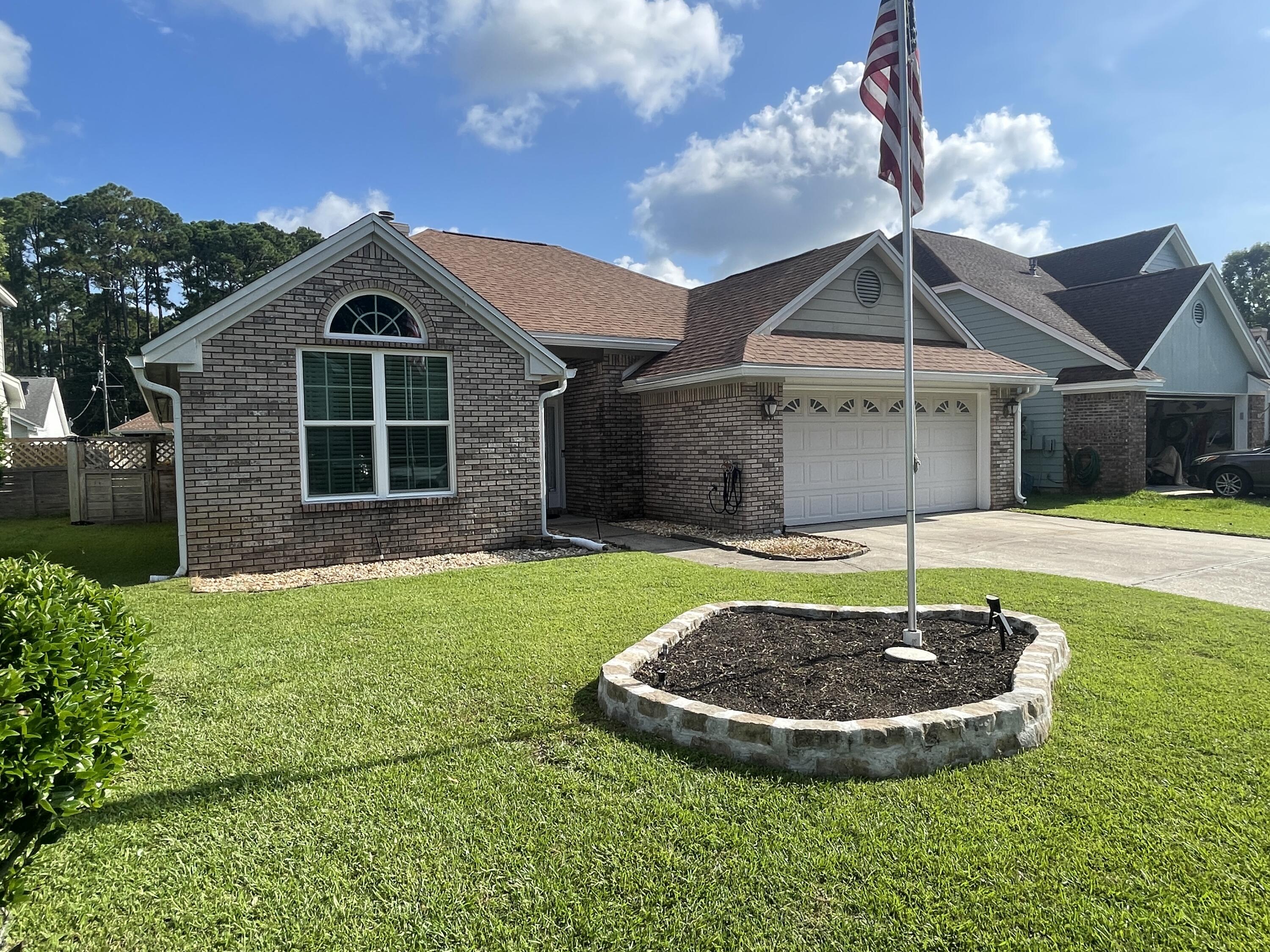 ***Move-In Special - $500.00 off the first month's rent***

Welcome to this lovely 3-bedroom, 2-bath home located in an established community in Wright (Fort Walton Beach)—perfectly situated between Eglin AFB and Hurlburt AFB for an easy commute to bases, beaches, shopping, and more.

This home features a split and open floor plan with a bright Florida room that adds extra living space and charm. The massive living room boasts vaulted ceilings, an arched doorway with columns, built-in shelving, and a cozy gas fireplace—ideal for relaxing or entertaining guests. The kitchen offers plenty of counter and cabinet space, a breakfast bar, a pantry, and a formal dining area for family meals or gatherings.  The spacious primary suite includes tray ceilings,  a dual vanity, a walk-in closet, a garden tub, and a separate shower.

Two generously sized guest bedrooms share a second full bath.

Enjoy the beautifully maintained lawn and privacy-fenced backyard, complete with a large open patio, perfect for outdoor entertaining. Modern touches include a smart thermostat and camera doorbell (tenant may set up their own accounts), as well as Bluetooth-capable bathroom vents with night light settingsa fun and functional upgrade.

Pets may be considered on a case-by-case basis with prior owner approval and a non-refundable pet fee. No smoking, including vaping, is permitted on the property.
