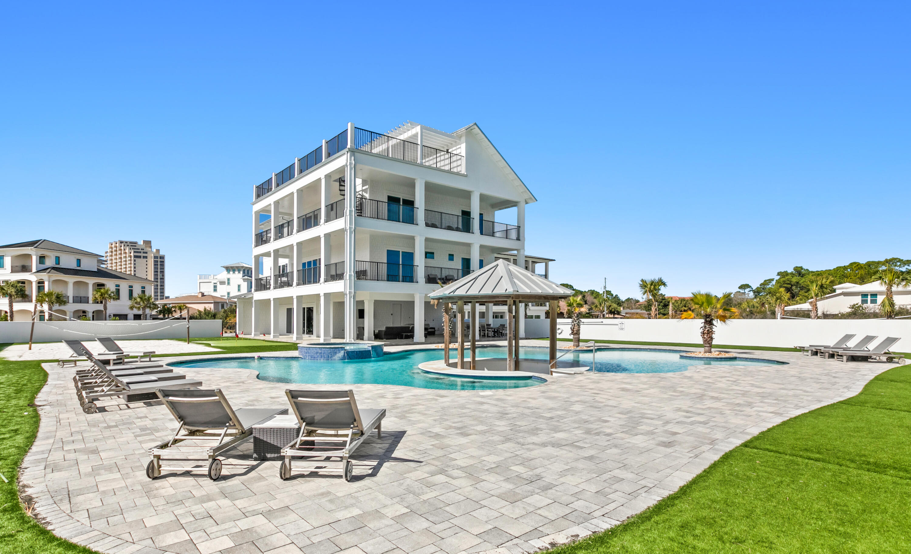 Rental powerhouse! As of 5/26/2026, $342,213 already on the books. Summer, fall and holidays still filling in. A treasured location with private beach. Even Pappy Van Winkle would savor Bourbon Beach, designed for best times in Florida's renowned Miramar Beach. With private deeded beach access, Bourbon Beach distills the best of beach living with outstanding architecture to serve up an unparalleled coastal experience. A huge resort-style pool, sand volleyball court, putting green and expansive outdoor deck keep the fun going beyond the beach. Indoor and outdoor kitchens - plus the family room kitchenette --create flexibility for the chef. The roof deck with stunning Gulf views is breath-taking. The half acre lot means plenty of room for the two-car garage plus driveway parking. Sold fully furnished and rental-ready. Continued .. Bourbon Beach is located in Gulf Pines, one of the most venerable neighborhoods along the beach. The deeded beach is private (access by key fob) and runs for hundreds of feet. The home can comfortably host 24 guests, with plentiful gathering spaces both inside and outside. In addition to 6 bedrooms, 3 flex rooms offer sleeping accommodations. Set on more than half an acre, the resort-style pool is one of the largest in the area.
While Whiskey Beach provides privacy, it is also close to shopping, dining and entertainment. 
Professional photos, video coming soon.
Don't miss this opportunity to own one of the area's finest homes.