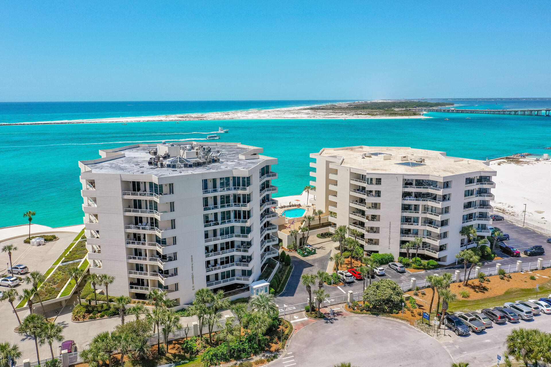 This lovely condo is your ticket to the fabulous beach lifestyle. Updated and stylish this condo has a commanding view of the Pass and the Harbor.  The balcony is spacious and wraps around the condo so you have a panoramic view of the water and the beaches. You can access the balcony from either bedroom.  Tile floor, granite counters, and stainless appliances. This property sleeps 6 so there is plenty of room for the whole family to make vacation memories and you can also cash in $$$$ on vacation rentals. Many fun restaurants and attractions in the area. Full size w/d, gated and there is a marina right across the street.