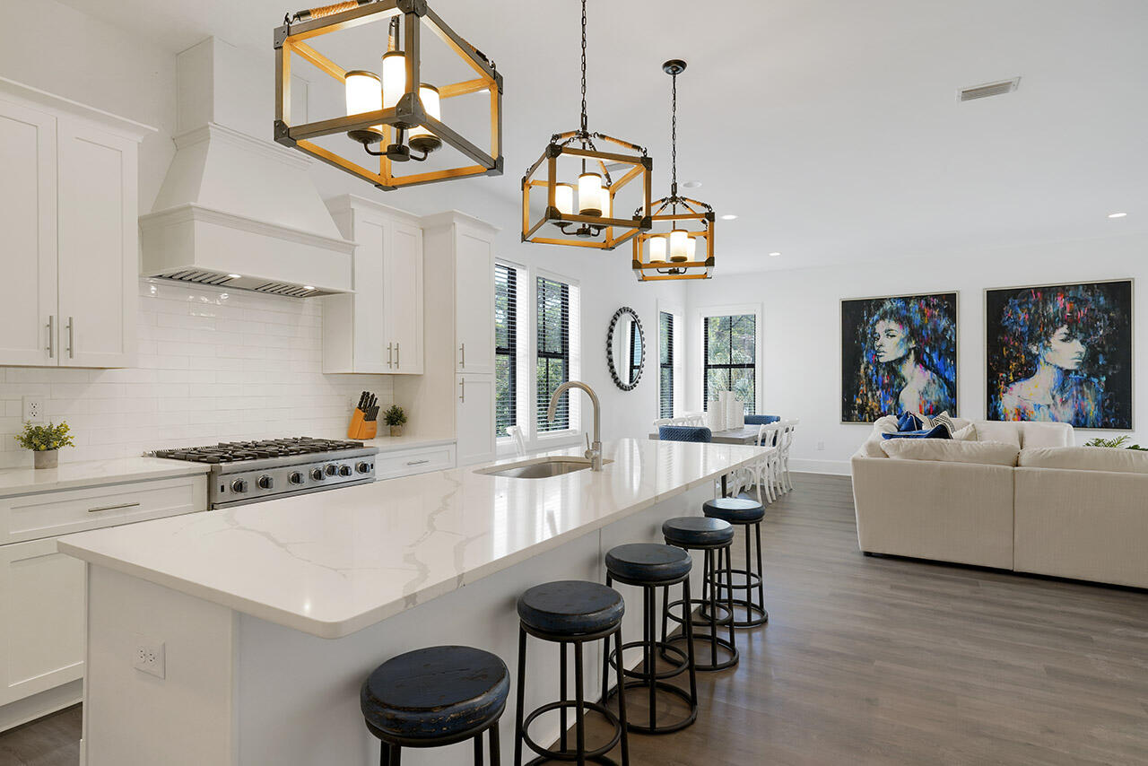Home now under contract. See listing for identical home at 118 Leisure Lane next door. 
 Brand New Construction and sold beautifully and newly furnished. There's still plenty of time to rent out for spring/summer season.  Steps from ultra-happening Shunk Gulley restaurant and 30A's widest public beach access at Ed Walline Park. Located adjacent to Gulf Place entertainment district. Plan on monthly afternoon art walks, Saturday concerts on the lawn, leisurely dinners at renowned restaurants, and memorable shopping. No wonder this ''has it all' home is projected to produce over $220K per year in vacation rental income. This newly built stunner sleeps 14 across 6 bedrooms, has a private pool that can be heated, an elevator that accesses all floors.
