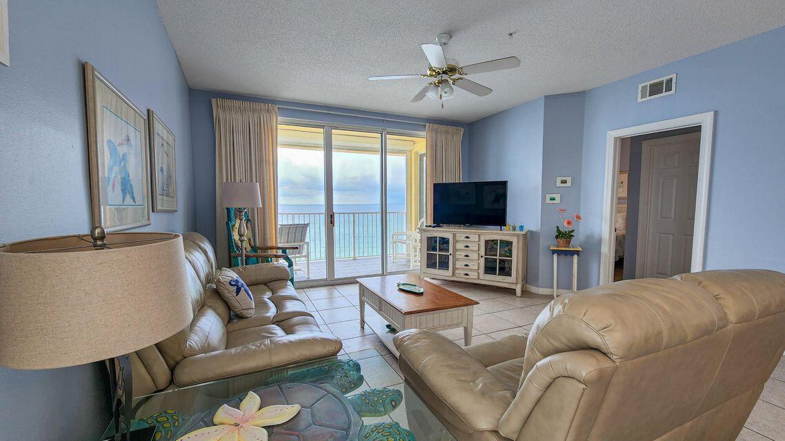 Welcome to Turtle Walk Condo, a beautiful beachfront property located on Okaloosa Island is the perfect rental or second home. This 3-bedroom, corner unit, located on the top floor, offers stunning endless views of the Gulf of Mexico from every room. The open concept kitchen, living, and dining area flow seamlessly together, providing the perfect space for entertaining and enjoying the breathtaking surroundings. The master bedroom, complete with its own private balcony access, features a luxurious en-suite bathroom with his and hers vanities, a soaker tub, and a separate shower. There are two guest bedrooms and full guest bathroom, complete with a double vanity, are of a good size. A full-size washer and dryer can be found in the convenient utility room. The unit is being sold fully furnished and is currently used as a vacation rental. Turtle Walk Condo boasts a community pool, covered parking, and beach access, making it the perfect getaway. The complex is located in a low-density area of the island, ensuring a peaceful and less crowded vacation experience. In addition, this condo is conveniently located close to shopping, dining, and many attractions on Okaloosa Island's Boardwalk and pier. Covered parking space #601 is included in the sale. Owners are allowed one pet under 20 lbs. Don't miss out on the opportunity to own your own slice of paradise at Turtle Walk Condo.