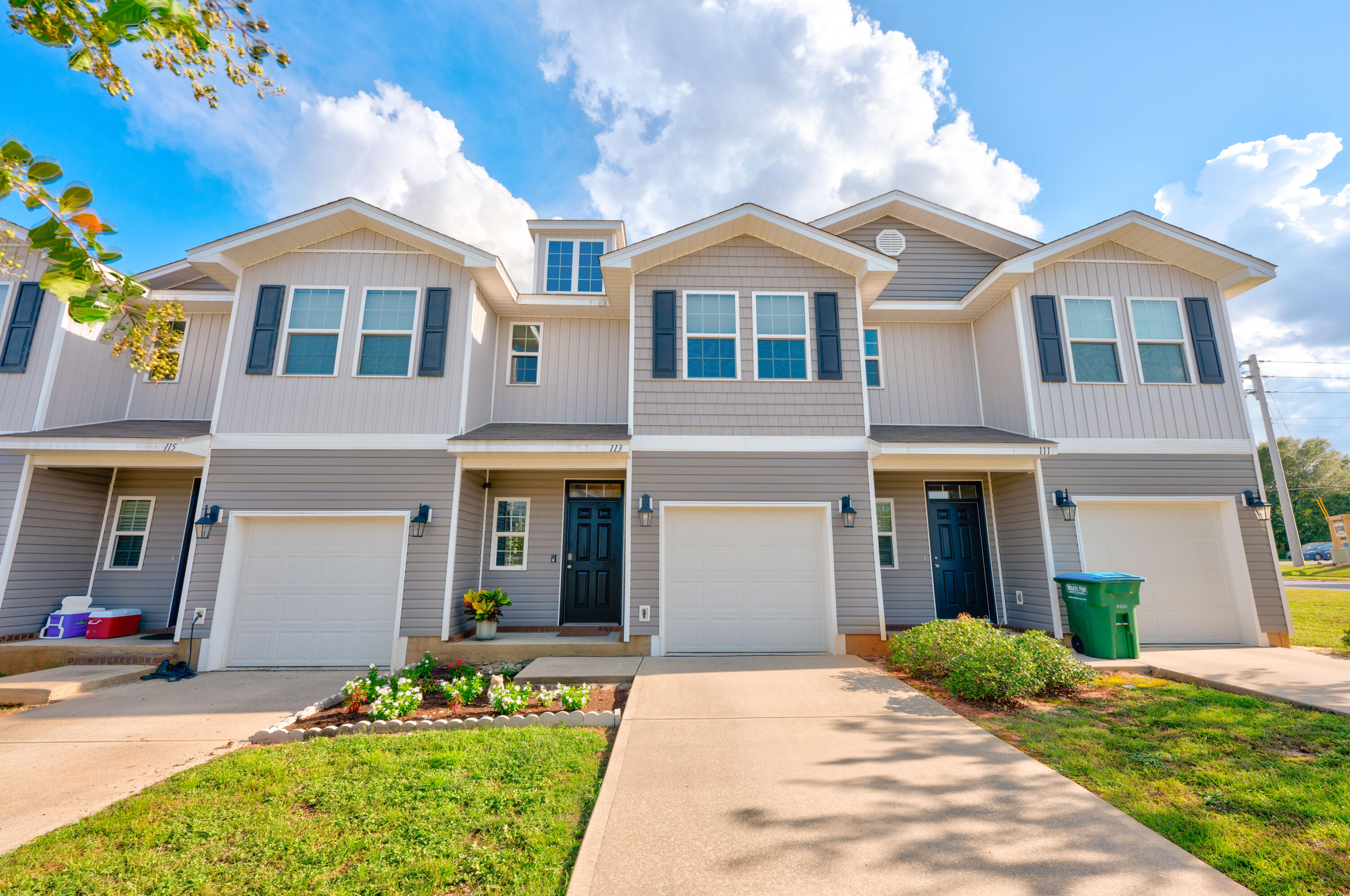 Take a look at this 2017 move-in ready townhome! Updated with granite countertops in the kitchen with a deep stainless steel sink and brand new subway tile backsplash, this home is made for entertaining. Board and batten feature walls in both the entry way and living area add character to make this unit stand out. Vinyl flooring throughout the first level along with a half bath, and carpet upstairs in all three bedrooms. Spacious master bedroom with a walk in closet and ensuite bathroom. Laundry is located upstairs making laundry day a breeze!