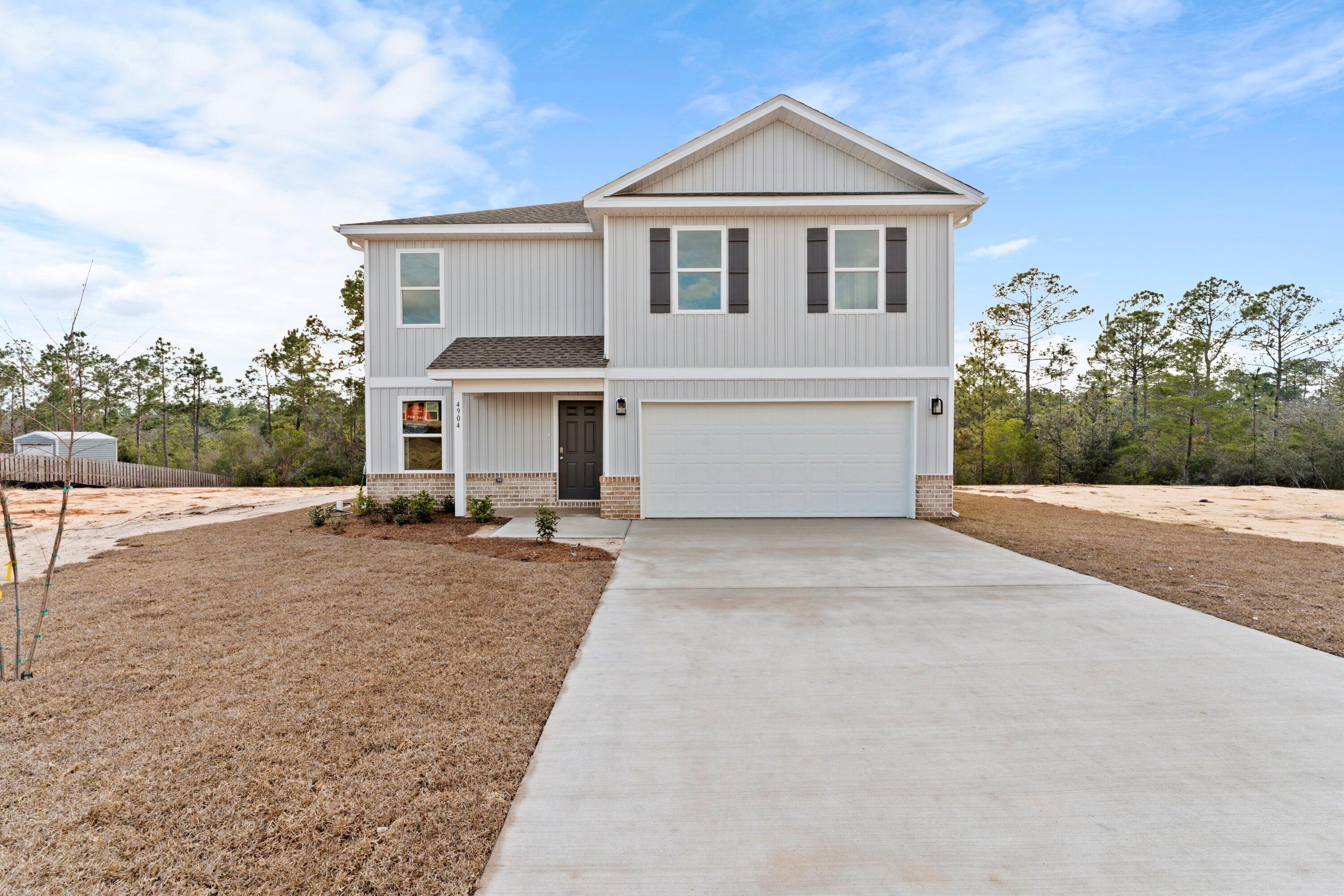 VA Promotion! Phillips Homes Builder is offering a 2/1 rate buy down and paying buyers closing costs with their preferred lender! Ask for details! SOUTH CRESTVIEW location 5 MILES to DUKE FIELD! Partridge Hills neighborhood with no through traffic. Move in ready! Phillips Homes is a semi custom builder and not a production home. The Orange Blossom plan features 4 Bed upstairs plus additional downstairs flex/office/playroom and 2.5 Baths. Upgrades are considered standard in this home. The kitchen features Quartz counters, stainless Fridgidaire appliances, breakfast bar, all white shaker cabinets, large corner pantry, stainless cabinet hardware, push button garbage disposal, and recessed lighting. Phillips Homes uses custom egg shell paint throughout the interior for easy cleaning. Half bath downstairs with pocket door, framed mirror and pedestal sink. Great room has glass sliders that lead to the covered back porch. Great view to a nice private backyard with a wooded treeline. Waterproof and Scratch resistant high quality LVP flooring throughout downstairs, and upstairs laundry and all bathrooms. Plush carpet in hallway and bedrooms. Laundry room upstairs by all the bedrooms. Primary suite is large, big walk in closet all double shelved, and ensuite bath. Bath features 2 separate vanities, quartz counters, walk in shower with glass door, towel bar package, water closet with a pocket door and a linen closet. Upstairs guest bath has large vanity with dual sinks, framed mirrors, cabinet hardware, quartz counters, towel bar package, and a tub/shower combo. All the 3 guest rooms are spacious. Tech features include a Smart Technology deadbolt system, CAT 6 pre-wired, Central location box for internet! Dual Carrier A/C Units to heat and cool each floor easily. That's right 2 full HVAC systems! One for each floor. This home offers low maintenance with all brand new systems! PEX Plumbing system and 50 gallon Water Heater! Dimensional shingle roof with gutters. Low home insurance rates available too! Hurry this great home is a great deal will not last long! Phillips Homes "Building Better Together!"