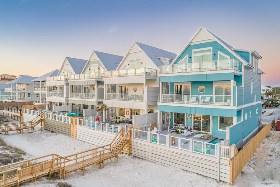 Graced with an impressive backdrop and located just minutes from restaurants, shopping and entertainment of Panama City Beach, this grandly proportioned 4,000 sqft beachfront estate was the subject of a carefully orchestrated by a world-class team of architects, builders, and craftsmen. On the main level, you will find a luminous great room overlooking the Gulf of Mexico perfect for entertaining or family gatherings. The modern and fully equipped kitchen is ideal for preparing a delicious dinner or having a quick snack on the bar top.
Each of the homes 7 bedroom offers a peaceful retreat after a day along the white sandy beaches. Fall asleep to the sounds of the waves in the spectacular master suite and sitting area, private balcony and en-suite spa-like bath with walk-in tiled shower. A sculptural staircase connects all three levels of the homes balconies providing optimal views of sunsets over the water. The upper level boasts a spacious bunkroom haven.
 
The focal point of the residence is the wonderful Gulf facing pool, heated for year round enjoyment. Surrounded by a sprawling pool deck with exceptional panoramic views of the water and private walkover to the beach, blending indoor & outdoor living in true Florida fashion.
 
Panama City Beach is a waterfront town and vacation destination in northwest Florida. It's known for miles of white-sand beaches fronting the calm, clear waters of the Gulf of Mexico. St. Andrews State Park, one of 2 protected nature preserves nearby, is bordered by the Gulf and has hiking trails and fishing piers. Pier Park is the main shopping hub and a venue for major events. To ease your installation, this unique home is offered entirely furnished and decorated. The property is ideal for both a second home or short-term vacation rental.