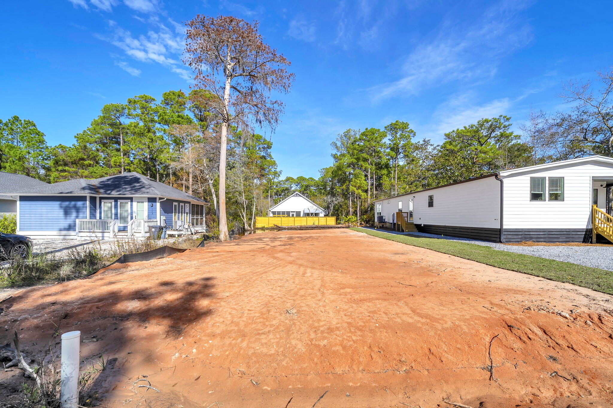 Cleared, filled, and ready to build! Site prep has been completed on this  50x150 lot in Point Washington, putting you one step closer to home. No HOA fees!  Located just minutes from Grayton Beach and 30A. Point Washington State Forest and Choctawhatchee Bay at your doorstep. 
Permits, stormwater plan, clearing, and fill have all been completed. Adjacent home also available for purchase.