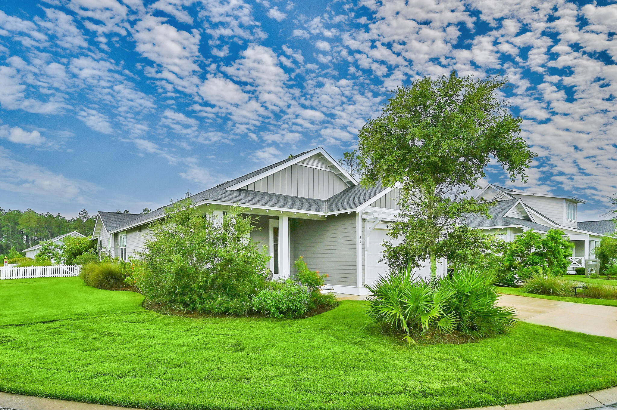 Coveted 3 bedroom, with an office and 3 bath home with panoramic water-views in one of the most secluded sections of WaterSound Origins. 39 E Sandlefoot is an upgraded ''Bayberry II'' by Huff Homes, their most desirable floor plan. Sprawling .18 acre corner lot, with a serene pond in the front and community green space in the back, this home induces tranquil living. Numerous upgrades including hardwood floors, quartz countertops and epoxy floors in the garage. The kitchen features top of the line appliances from brands such as Bosch and Sharp. A thoughtful upgrade can be seen in the kitchen with the dry bar featuring additional cabinets and an elegant tile backsplash. The living and dining areas seamlessly flow together, great for keeping everyone included and entertaining. The primary bedroom includes sprawling hardwood floors lit up by the natural light from the sizable windows. The primary bathroom offers both a tub and a freestanding shower, dual vanities, quartz countertops, marble shower floors and a large walk-in closet. There is a large private office in the front of the home and may easily be converted to bedroom or secondary living area. The two guest bedrooms offer ample space, one including a large ensuite bath with quartz countertops and marble shower floors, similar to the primary bath. The backyard is the perfect place for a private tranquil afternoon or a night of entertaining, with a large screened in patio featuring a substantial television.
 
Homeowners may access WaterSound Origins fitness center, seasonally heated community pool, and direct dock access to Lake Powell with kayaks and canoes provided by the community. Plus the Executive Golf course, tennis / pickle ball courts, basketball court and hiking/biking trails all within the community. WaterSound Origins also connects to the Panama City Beach Conservation Park via a 5-mile trail for the nature lover. Located just a short distance from the community town center with Brand New Publix, Scenic Highway 30A with countless dining, local shopping, events, and attractions. Owners also have the opportunity to join the St. Joe Beach Club featuring: private beach access, beach services, 2 pools, multiple restaurants, and a bar with gulf views, 2 private golf courses (Camp Creek and Sharks Tooth) and coming soon the Lifestyle Center at Camp Creek. Please inquire with membership for more info and latest offerings.