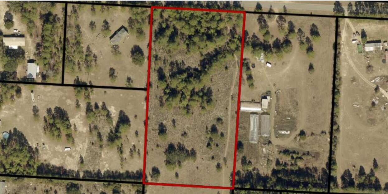 4.810 Acres in East Milton.  Parcel zoned as Rural Residential Agriculture (AG-RR). The allowable density for Rural Residential Agriculture is 1 dwelling unit per acre. 

Conveniently located close to I-10.  Located in American Farms with direct access off of Redland  Road.