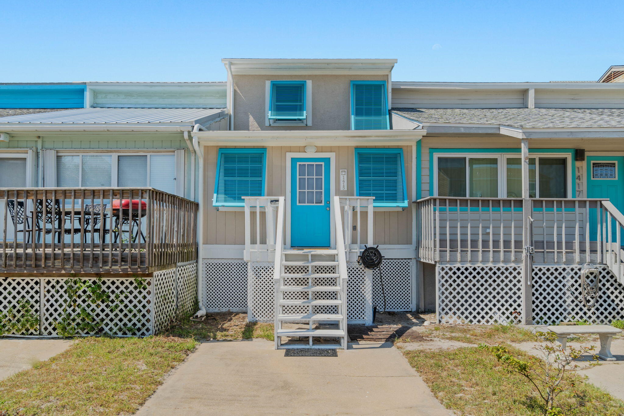 *Rare Find!* Welcome to Salt Therapy on Navarre Beach! This adorable and recently fully updated 2 bed/2.5 bath townhome retreat is walking distance to the beach and perfect for an investment property or primary residence where you can enjoy the best of the Emerald Coast! Currently used as a short term rental and being offered fully furnished (with a few exclusions) you'll love having NO HOA which means no mandated rules over how you can use your property and no worry of extra monthly fees or special assessments! You can even bring your boat with you on vacation and drop in in the nearby Navarre Boat Ramp. Pull into the driveway and you'll love the inviting exterior with functional and attached hurricane shutters. The entry room is a fantastic space to drop your beach gear after a long day in the sun. There's built in storage for supplies and beach gear on one side, and lockable Ikea cabinets (currently used as owner storage) that will also convey. Continue entering in the unit and you'll love the fully tiled downstairs with a half bathroom for easy access, and a great sized living room with plenty of seating to enjoy complete with a pull out couch. All the furniture was new in August/September 2022! The unit currently sleeps 8, in addition to the downstairs sleeper sofa upstairs there's a queen in the master bedroom, and bunk beds in the guest bedroom (a twin over a full with a pull out twin). There's also a convenient pack n play for families traveling with little ones along with extra baby supplies and books, and an interior laundry closet with a stackable washer and dryer! The kitchen and bathrooms have been beautifully updated with lovely quartz counters, undermount sinks, and updated faucets and hardware, and the kitchen has timeless subway tile backsplash and stainless appliances. There's an eat in kitchen space to enjoy, or take your meal out and enjoy one of two back decks where you can grill on the electric grill! There's a patio off the living room, and also off the master bedroom where you have peekaboo views of the water and the decks were completely rebuilt with Trex composite deck boards and brand new Trex railing systems in 2022. The kitchen is fully stocked and rental ready for you to continue using with all the supplies you and/or guests would need!  Have peace of mind with a new roof installed in 2020, a new HVAC in 2019, a new water heater in 2019, and the entire house had all new plumbing installed in 2019 as well! See full list of seller updates provided. Welcome to Navarre Beach and come own a piece of paradise!