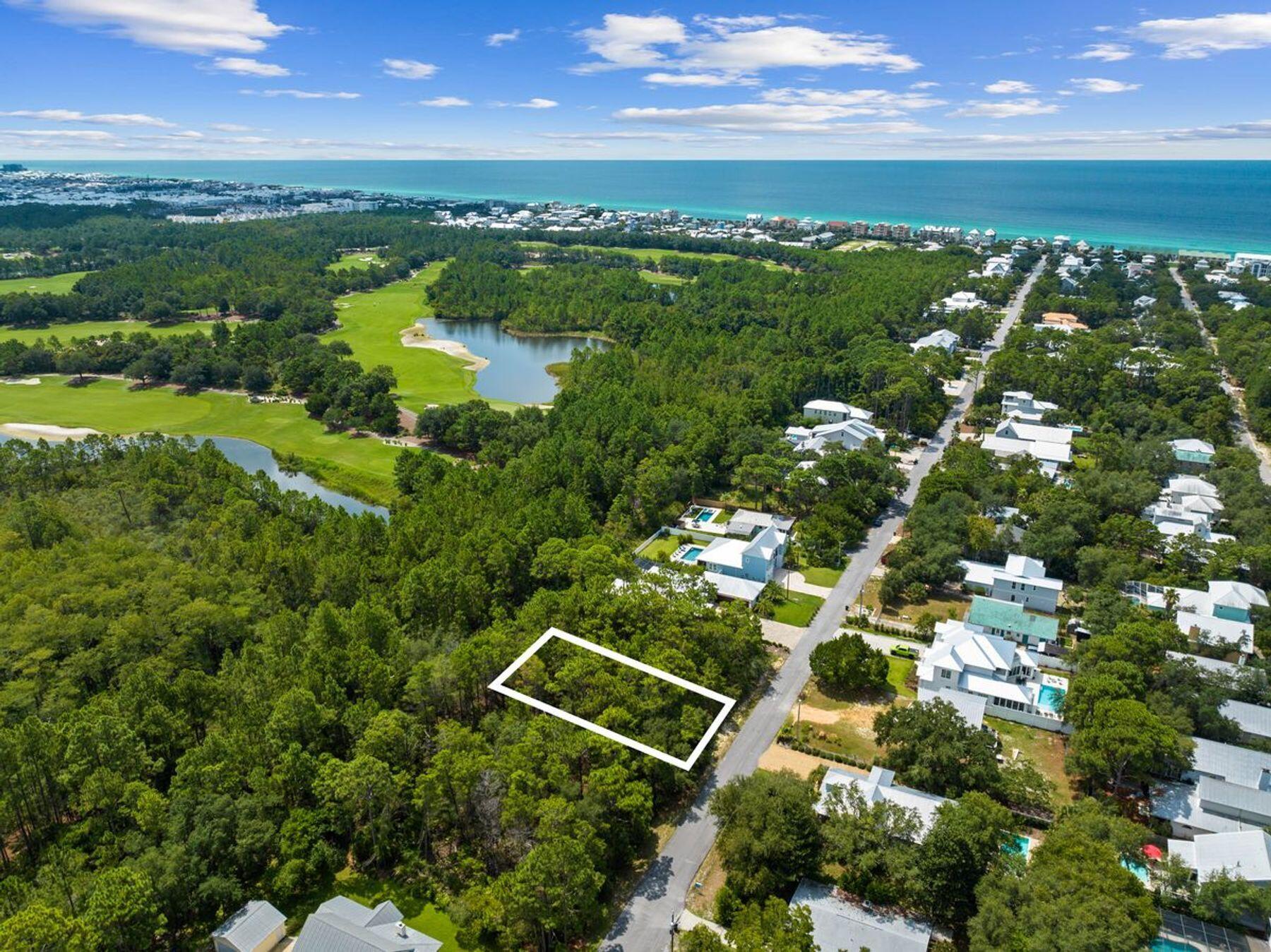 Discover the epitome of coastal living in this prime Seacrest property, seamlessly blending serene surroundings with unparalleled access to luxury amenities and natural beauty along Scenic Highway 30A. This generous lot offers exceptional potential for building your dream home, making it ideal for primary residences or vacation rentals. One of the unique selling points of this generous lot is its strategic location. To the north, you'll find the tranquility of a state forest, perfect for nature enthusiasts. Adjacent to the east lies the distinguished Tom-Fazio-designed golf course at Watersound Camp Creek, offering a haven for golf aficionados. The shimmering Gulf of Mexico is just a short distance away beach access at the end of the Seacrest Drive. Situated on a quiet street, this property promises a peaceful environment, ideal for a primary home. The allure of nearby upscale communities such as Alys Beach and Rosemary Beach adds to the charm, providing a range of dining, shopping and cultural experiences. To the west, the vibrant Big Chill entertainment and dining hub, as well as Seagrove Beach, offer additional options for recreation and leisure.