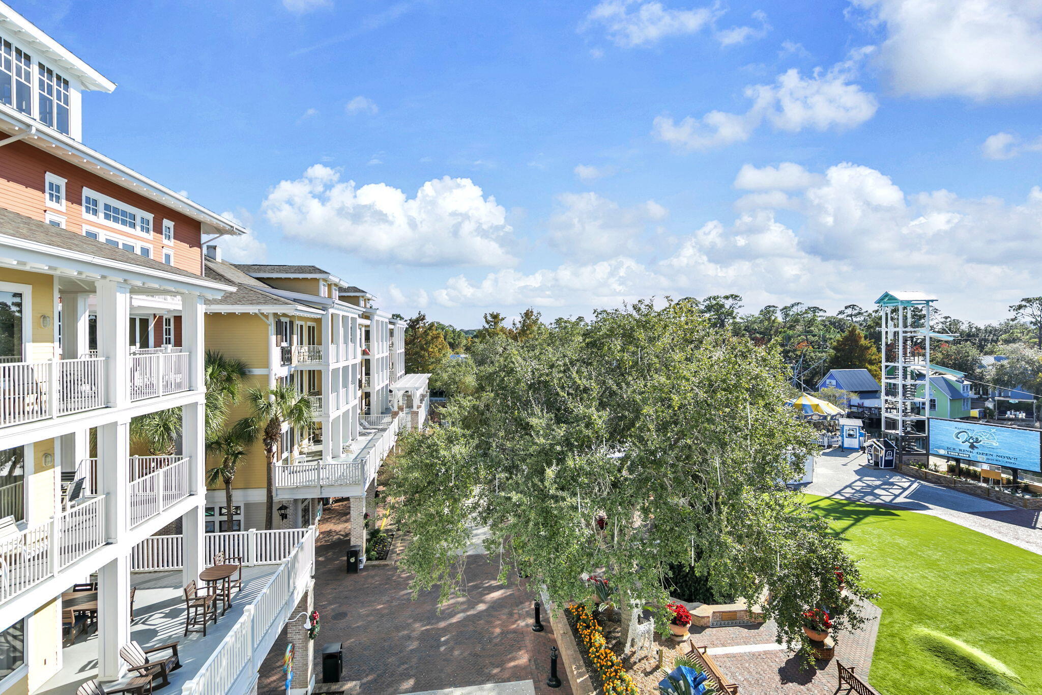 Enjoy all  the shows and concerts that the Village of Baytowne Wharf has to offer from the comfort and privacy of your own balcony. This 4th floor unit overlooks the Events Plaza .which maximizes rental capabilities with three different rental configurations (two bedroom, one bedroom, & studio). Hard surface, wood look flooring provides for easy maintenance and clean up. The open living area features a dining area, living space, and kitchen with breakfast bar. Retreat to the Master Suite where you can relax in the king size bed. The Master Bathroom has a double sink vanity, walk-in shower, and soaking tub. Guests will enjoy the privacy of their own studio with two queen sized beds, a fully stocked kitchenette, & a private bathroom. 
Owners have access to the amenity terrace which boasts a resort style pool, hot tub, fitness center, and a beautiful lawn with a grilling area. Owners and their guest also enjoy exclusive access to the Founders Club, a gathering place with kitchen, couches, big screen tv, pool table and balcony overlooking the events plaza.
Sandestin Golf and Beach Resort features more than seven miles of beaches and pristine bay front, four championship golf courses, 15 world-class tennis courts, a 226-slip marina, a fitness center, spa and celebrity chef dining. Shop, dine and play at the charming pedestrian village, The Village of Baytowne Wharf and more. Inside the gates of the resort, residents enjoy a balanced lifestyle of high-class living, spanning the 2,400 acres from the beach to the bay. Everything within the gates of the resort is accessible by golf cart or bicycle. The entire resort is interconnected by miles of pedestrian, bike and golf cart paths that weave through groves of live oaks, meandering past natural lagoons, fountains, man-made lakes, and meticulously landscaped fairways.