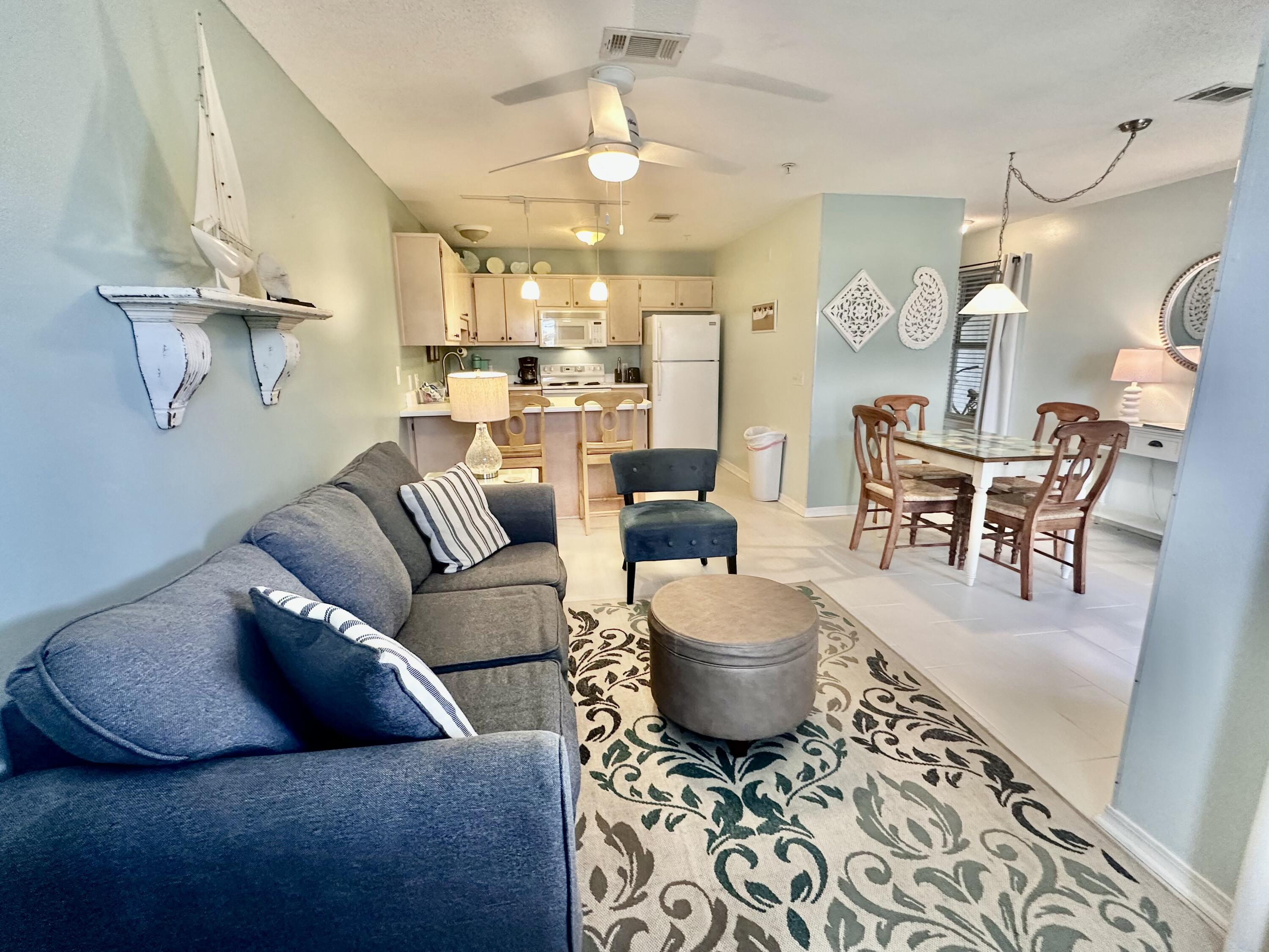 Don't miss this rare opportunity to own a charming 1-bedroom, 2-bath beach condo in the serene Sunset Harbour Villas on beautiful Navarre Beach! Perfectly situated between the Intracoastal Waterway and the Gulf of Mexico, this coastal retreat offers breathtaking views of the Sound and is just a short 2-block stroll to the sandy shores.

Step inside, and you'll immediately feel at home in this turn-key, fully furnished condo with a cozy coastal cottage vibe. The open-concept living area flows into a spacious kitchen, making it perfect for relaxing or entertaining. Ceramic tile flooring throughout adds to the beachy charm.

Enjoy the tranquil Sound views from your back porch and living room, or take a dip in the large community pool, just steps away.  The spacious bedroom features a king-size bed, flat-screen TV, and private ensuite bathroom with a tub/shower combo. A hallway alcove with built-in bunk beds provides additional sleeping space, and a second full bathroom with a walk-in shower adds extra convenience.

Located in a quiet beach community, this condo offers the best of coastal livingwhether you're relaxing by the water, grilling at the community BBQ area, or heading down to the pristine beach just minutes away.

Come experience beachside bliss and stunning Sound viewsschedule your showing today!