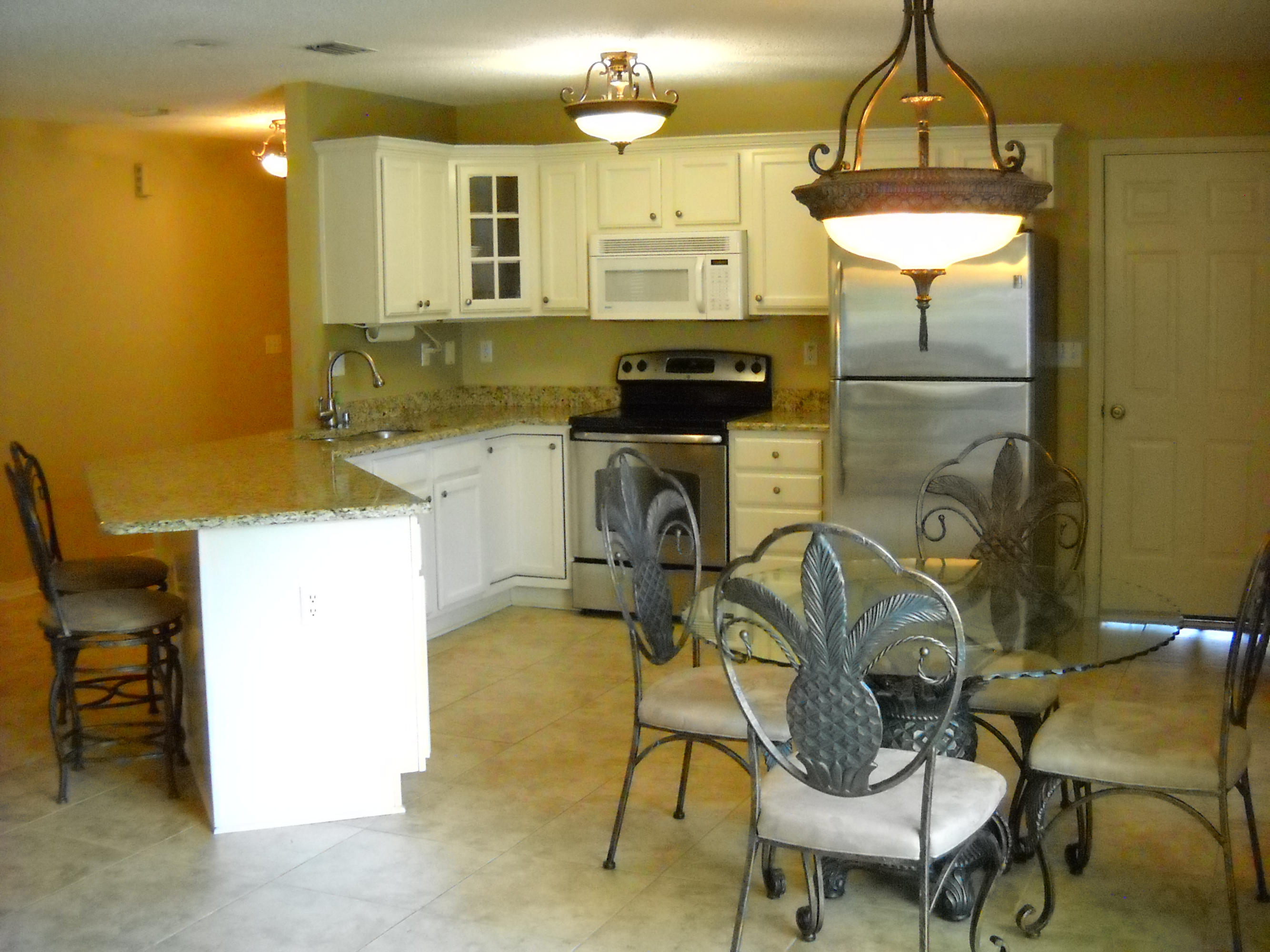 Outstanding location near the Heart of Downtown Destin,and loaded with many upgrades!
Entering the home you will appreciate the spacious tiled living area adorned with beautiful lighting throughout. Granite countertops in the kitchen, master bedroom bathroom and guest bathroom compliment the other quality finishes the home has to offer. The Master bedroom is tiled as well with a
Large walk-in closet. Two other bedrooms at the front of the home are separated by a full bathroom.
Located on a cul-de=sac with a yard that is easy to keep, this home is only a few moments away from one of the Top 5 Harbors in the nation with the Harbor walk's Dining, shopping and entertainment venues readily available.
Great location for getting to the Military bases as well, and qualifies for VA finan