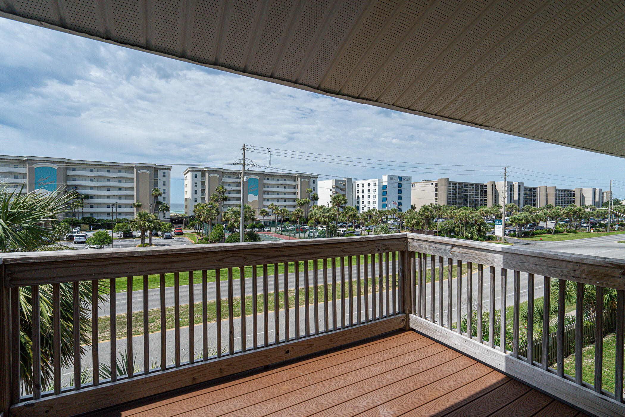 Great investment opportunity on fabulous Okaloosa Island! Boasting 3 miles of beautiful white sand beaches with 7 beach accesses along the emerald green waters of the Gulf.  Located across the street from beach access. Just over a mile beach walk or short drive to the boardwalk, pier, restaurants, and accessible to marinas and boat rentals. Also located just west of Destin. This top floor corner unit has Gulf and Inter Coastal Water views. It also has a great balcony with Gulf views. Attic access for extra storage. 
Walkable to restaurants, convenience store, 7 public beach accesses, and bay access. 
This property can be long term or short term rental. Also a great property to call home. It's all about location! Endless renovation potential!