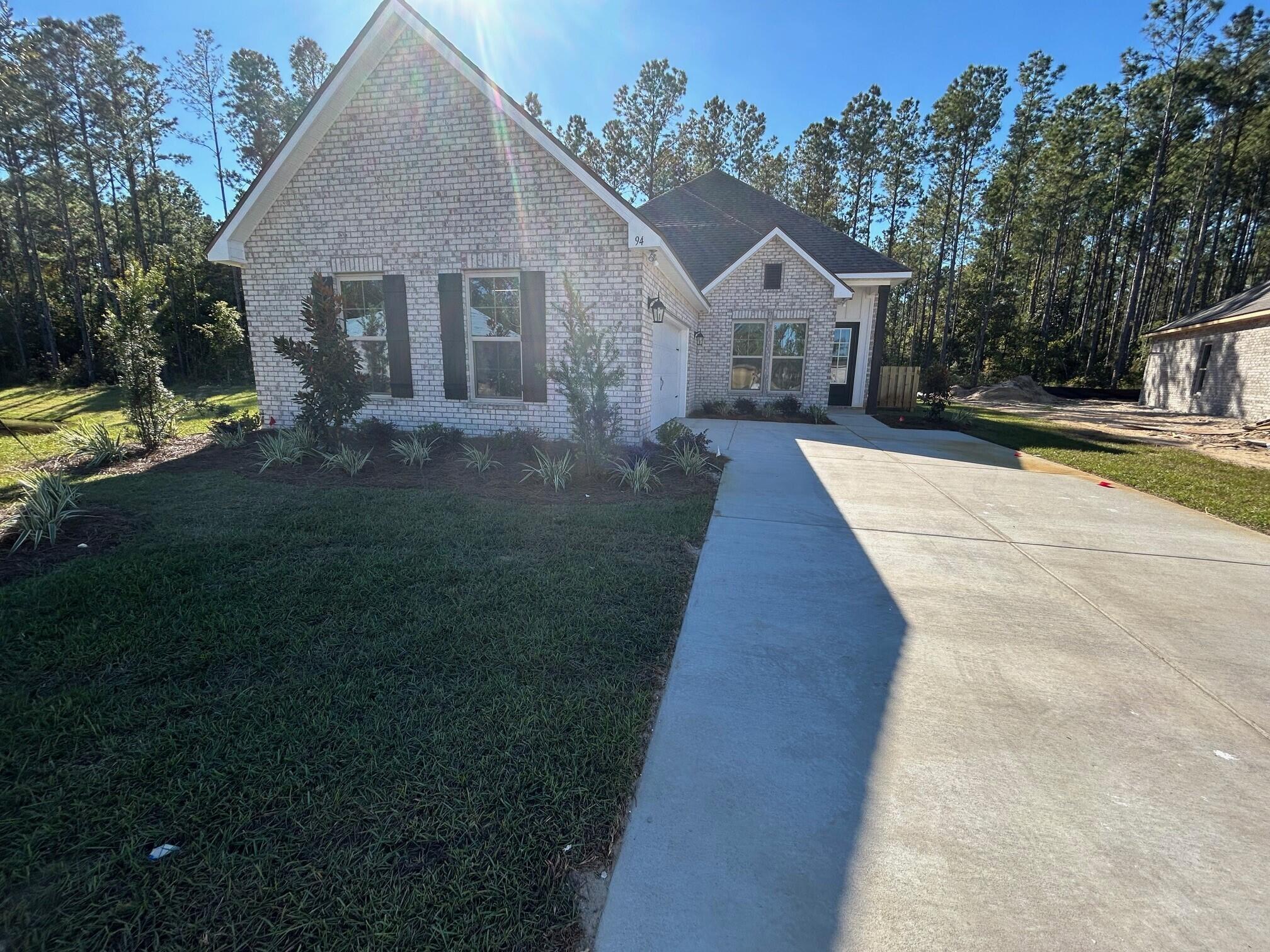 Located on a cul-de-sac lot, the AUBRY III G in Splendor at Hammock Bay community offers a 4BR, 2BA, open design. Upgrades added (list attached).  
Features: double vanity, garden tub, separate custom tiled shower, and walk-in closet (opens to laundry) in master bath, tray ceiling in master bed, walk-in pantry, covered rear patio, side entry garage, crown molding, recessed lighting, smart connect Wi-Fi thermostat, smoke and carbon monoxide detectors, landscaping package, architectural 30-year shingles, flood lights, and more!
Energy Efficient Features: water heater, kitchen appliance package with electric range, vinyl low E windows, and more! Energy Star Partner.