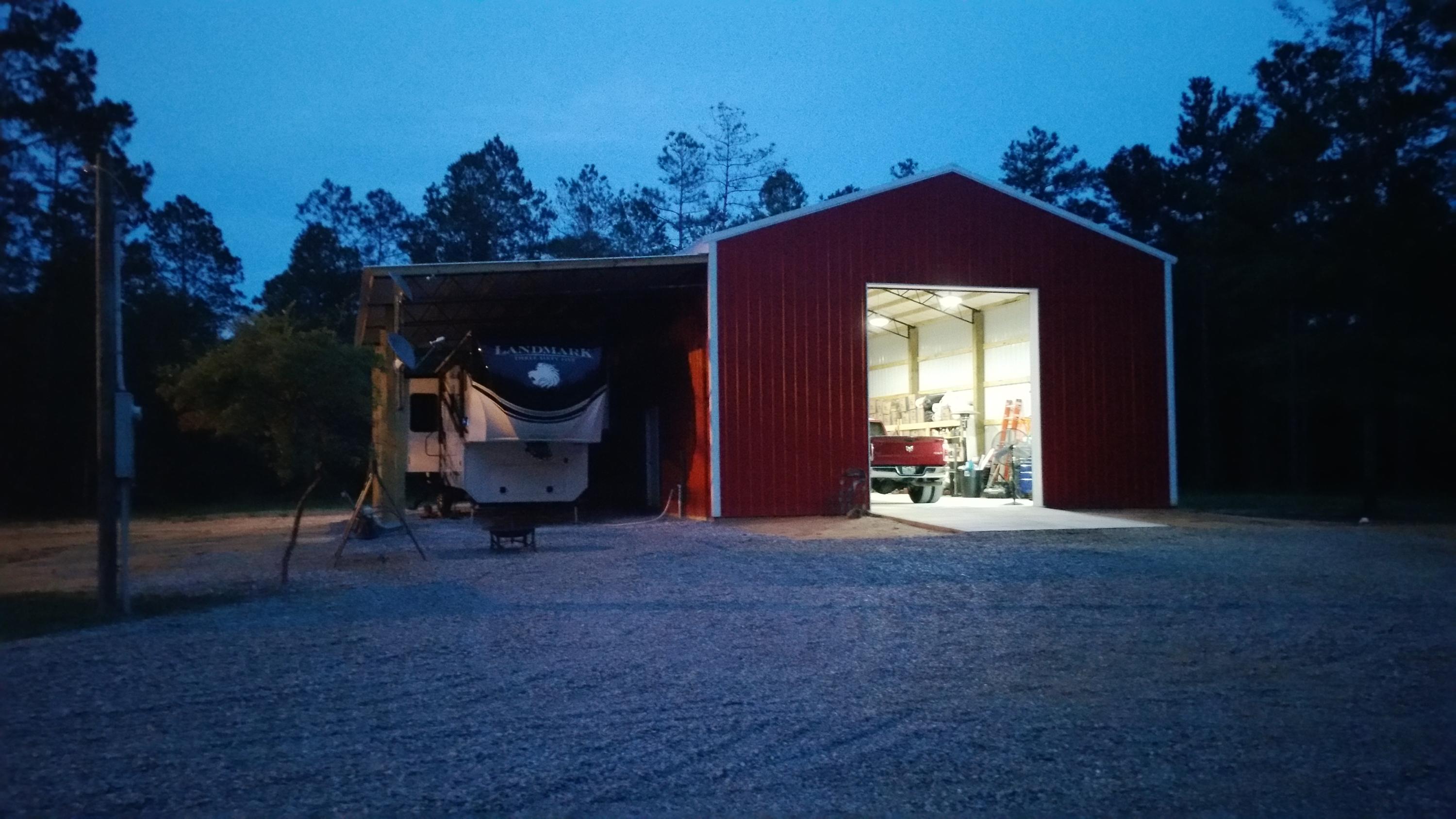 BEAUTIFUL!! 40acres with a gated entrance and a long gravel driveway; 32x48 brand new workshop with 18x48 lean-to, 12x15 electric roll-up door, and a full custom bathroom (includes water heater, and tiled shower); $15,000 worth of land clearing around main area; RV hookups; and bonus shed with water and electric. Turkey and deer are in abundance here!